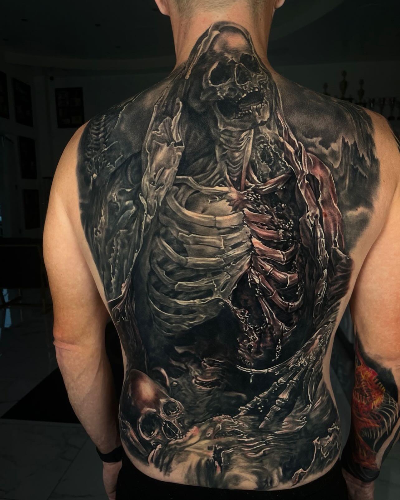 Skeleton realism tattoo on the back by Stacy Lavette
