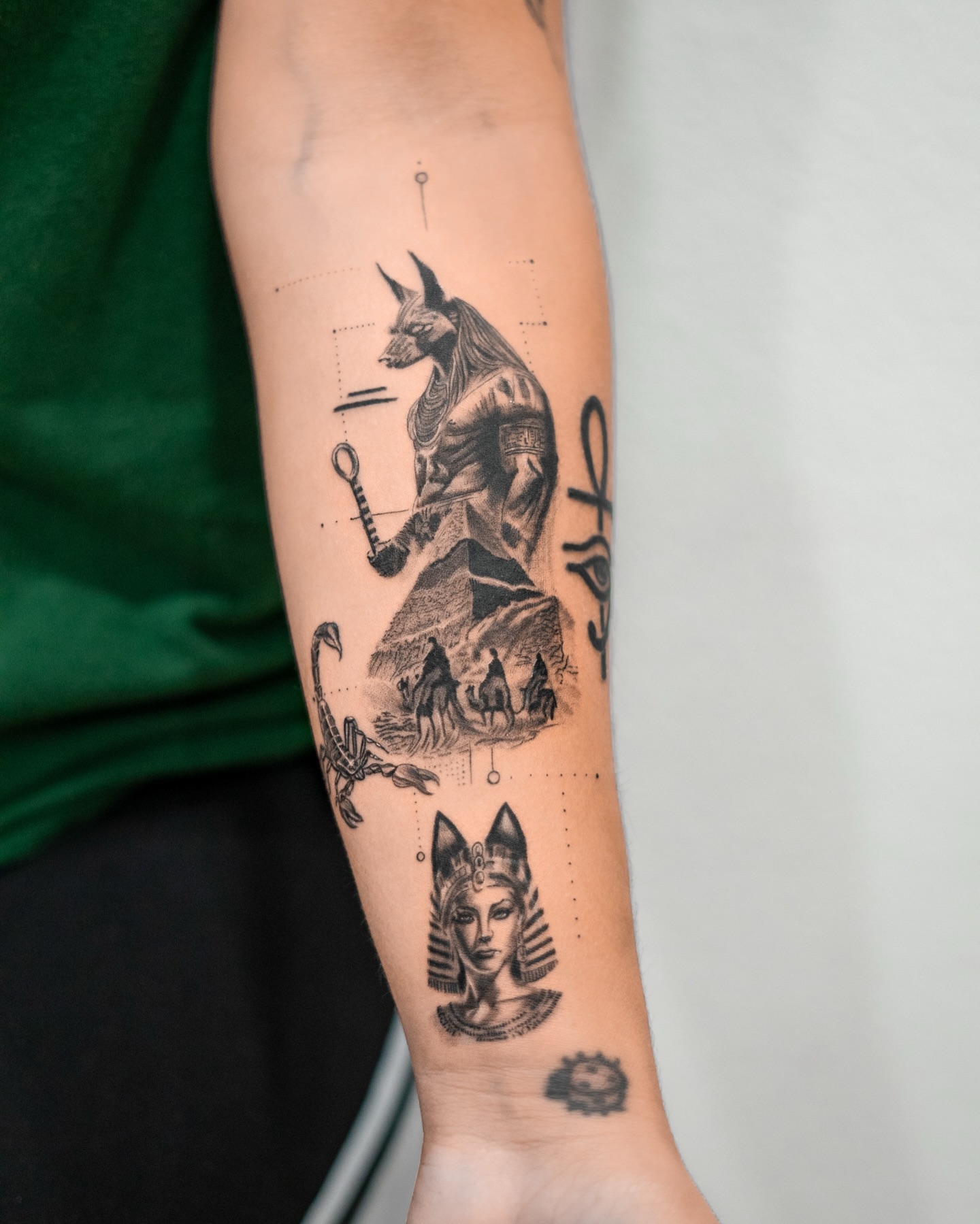 Ancient egyptian deities geometric tattoo on the forearm by The Tattoo Plug