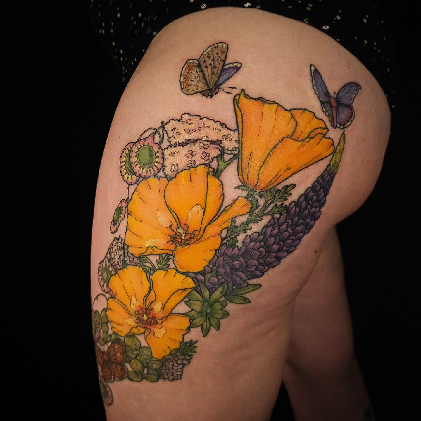 Flowers and butterflies watercolor tattoo on the thigh by Eva the Tattoo Fartist in Seattle, WA, Seattle, Washington