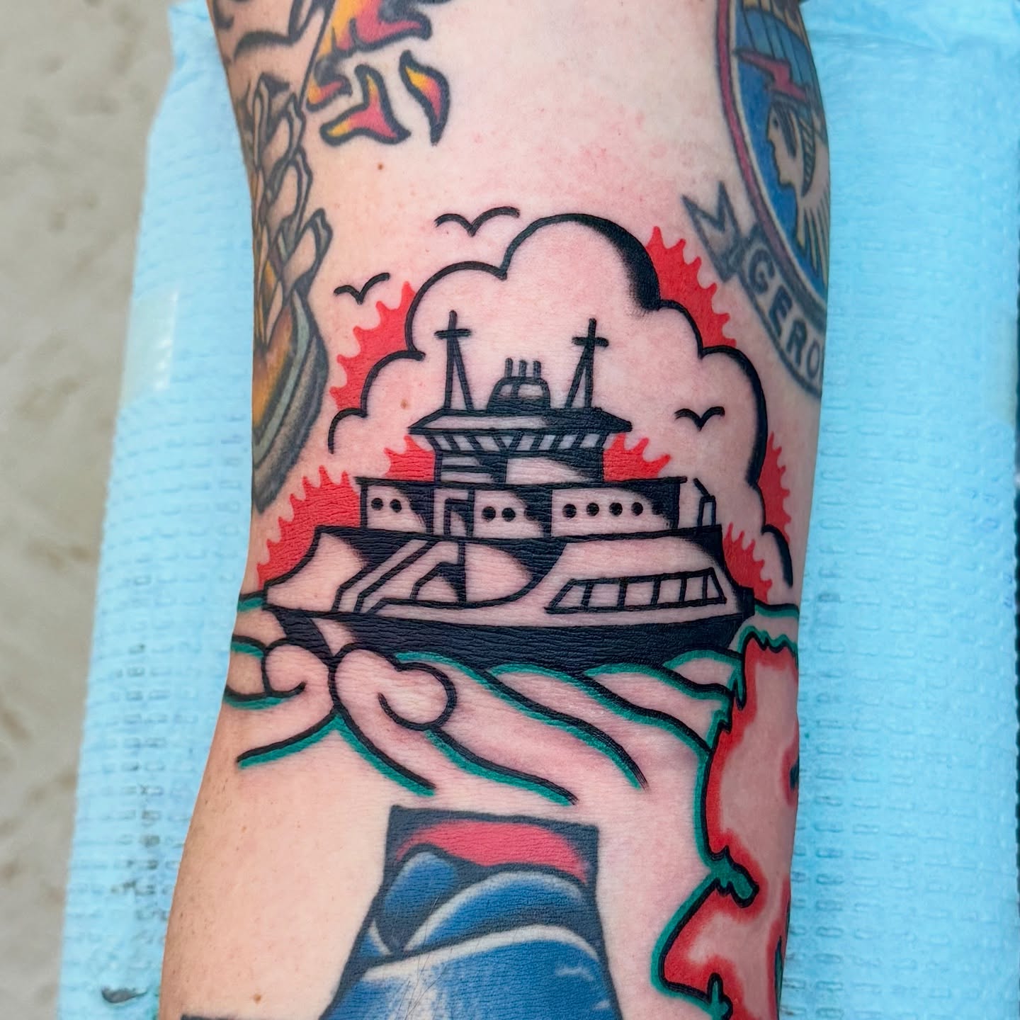 Ship American traditional tattoo on the forearm by Sam