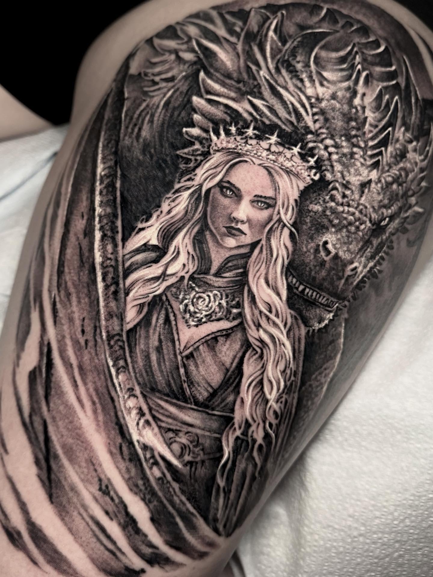 Dragon and queen realism tattoo on the forearm by Gabe Jensen