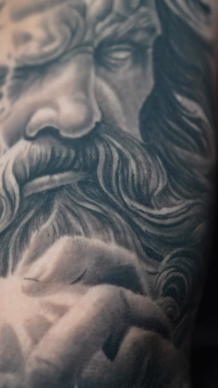 Zeus holding a lightning bolt realism tattoo by Drex - Dallas Tattoo Artist
