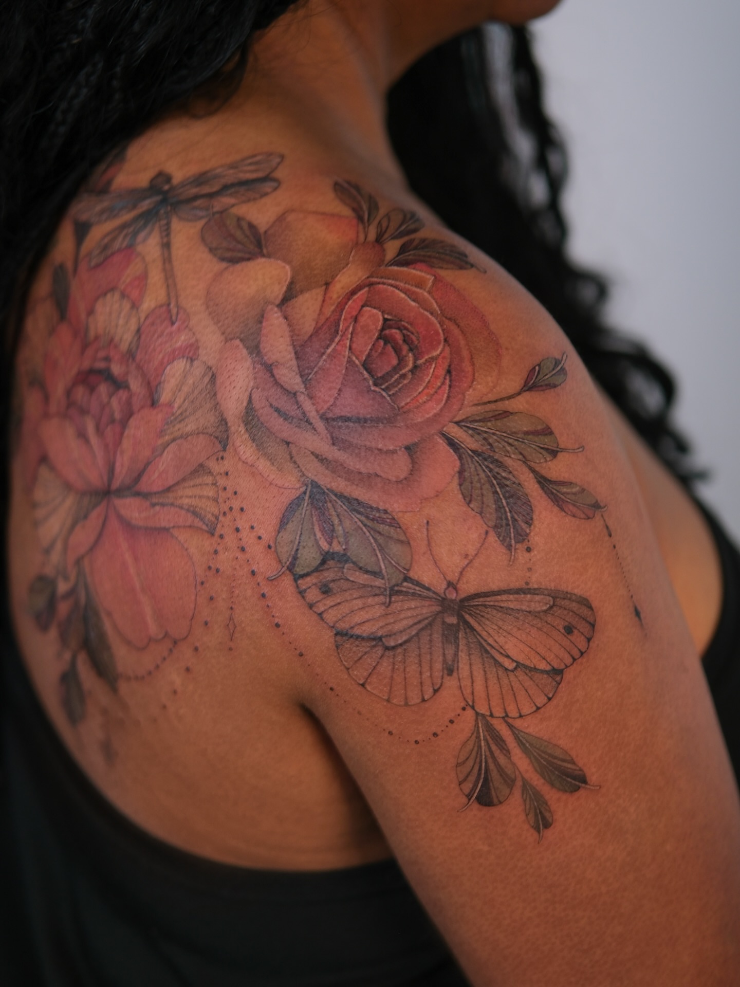 Floral arrangement realism tattoo on the shoulder by Flower Tattoo Sf