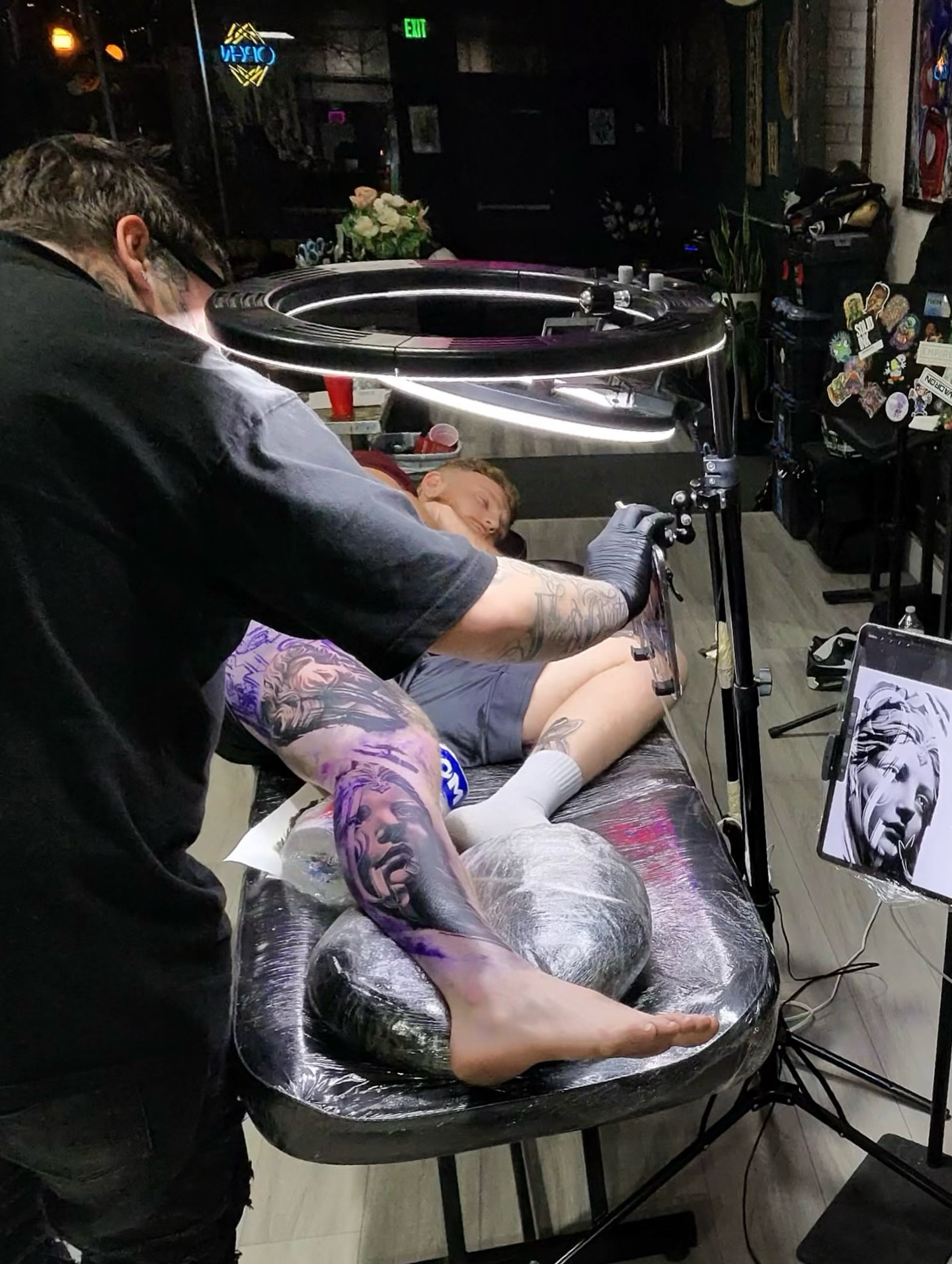 Portrait realism tattoo on the leg by Donald Reynolds