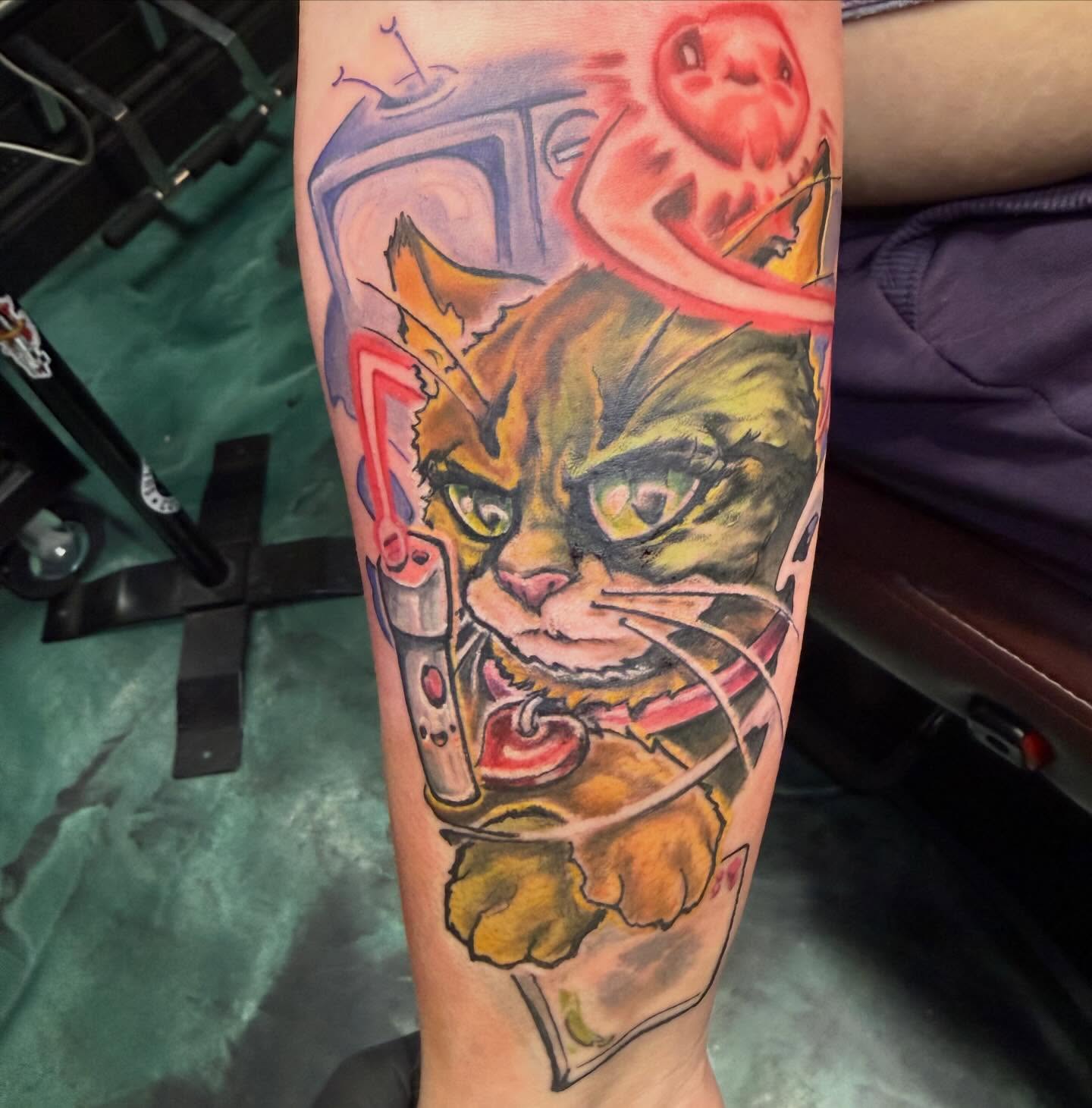Cat with mechanical elements realism tattoo on the forearm by Devon Beyer, Mission, Kansas