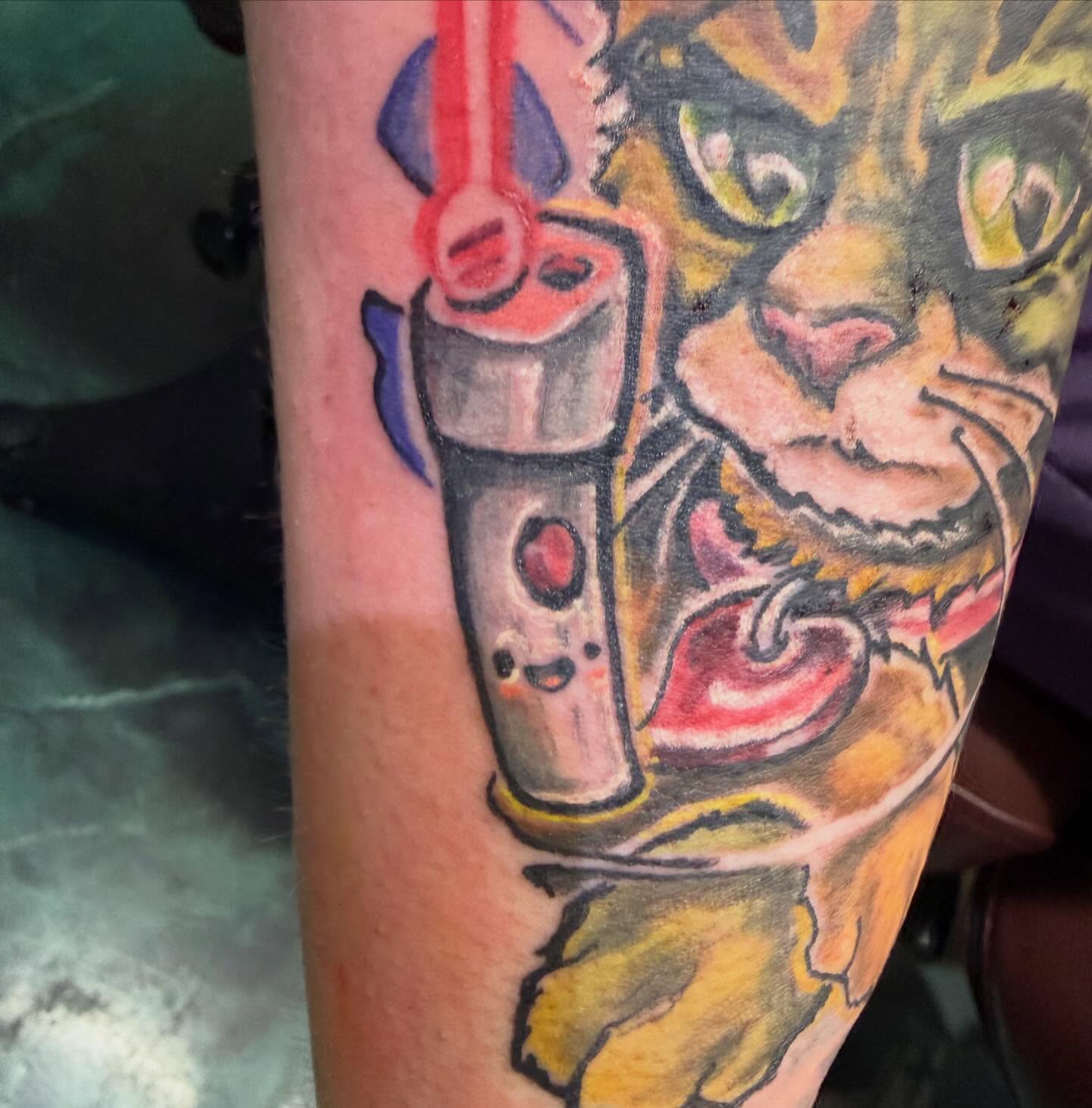 Cat and soda American traditional tattoo on the forearm by Devon Beyer, Mission, Kansas