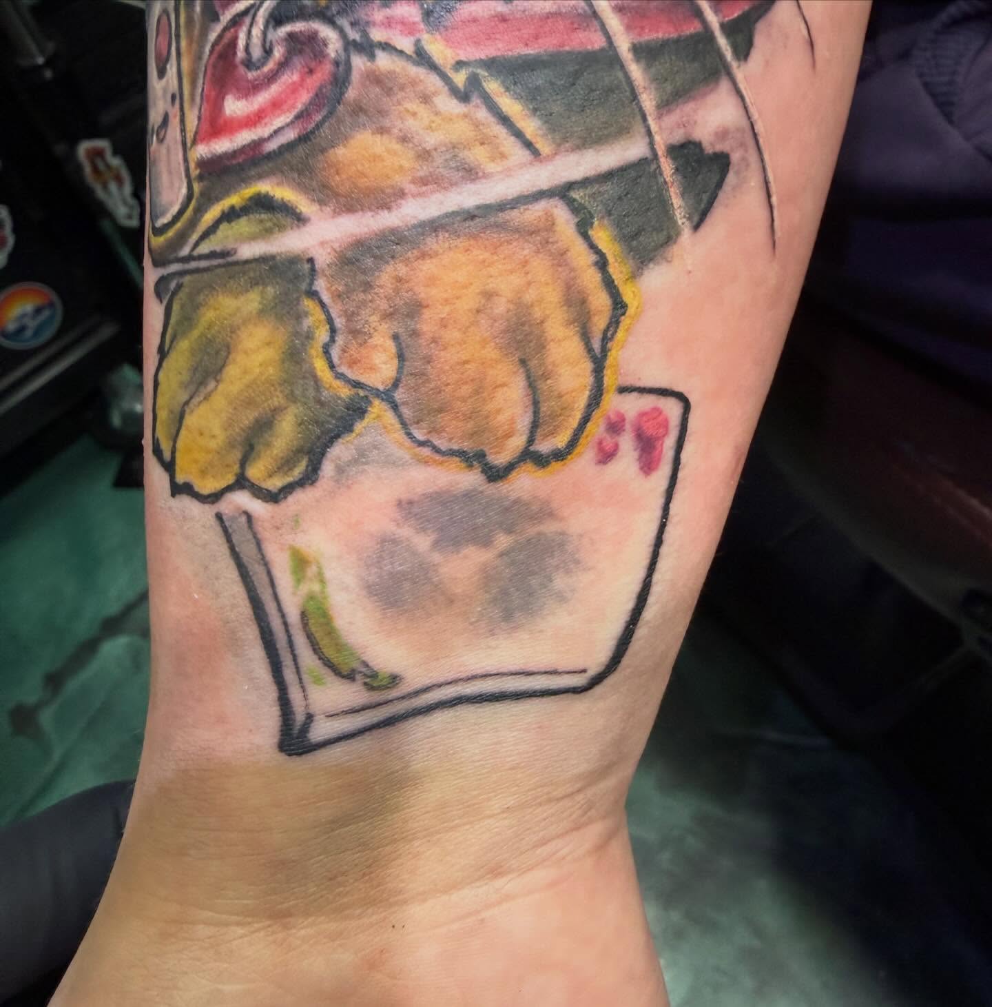 Cat American traditional tattoo on the forearm by Devon Beyer, Mission, Kansas
