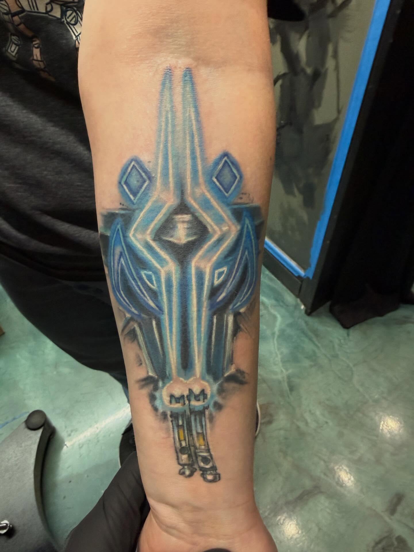 Geometric design geometric tattoo on the forearm by Devon Beyer, Mission, Kansas