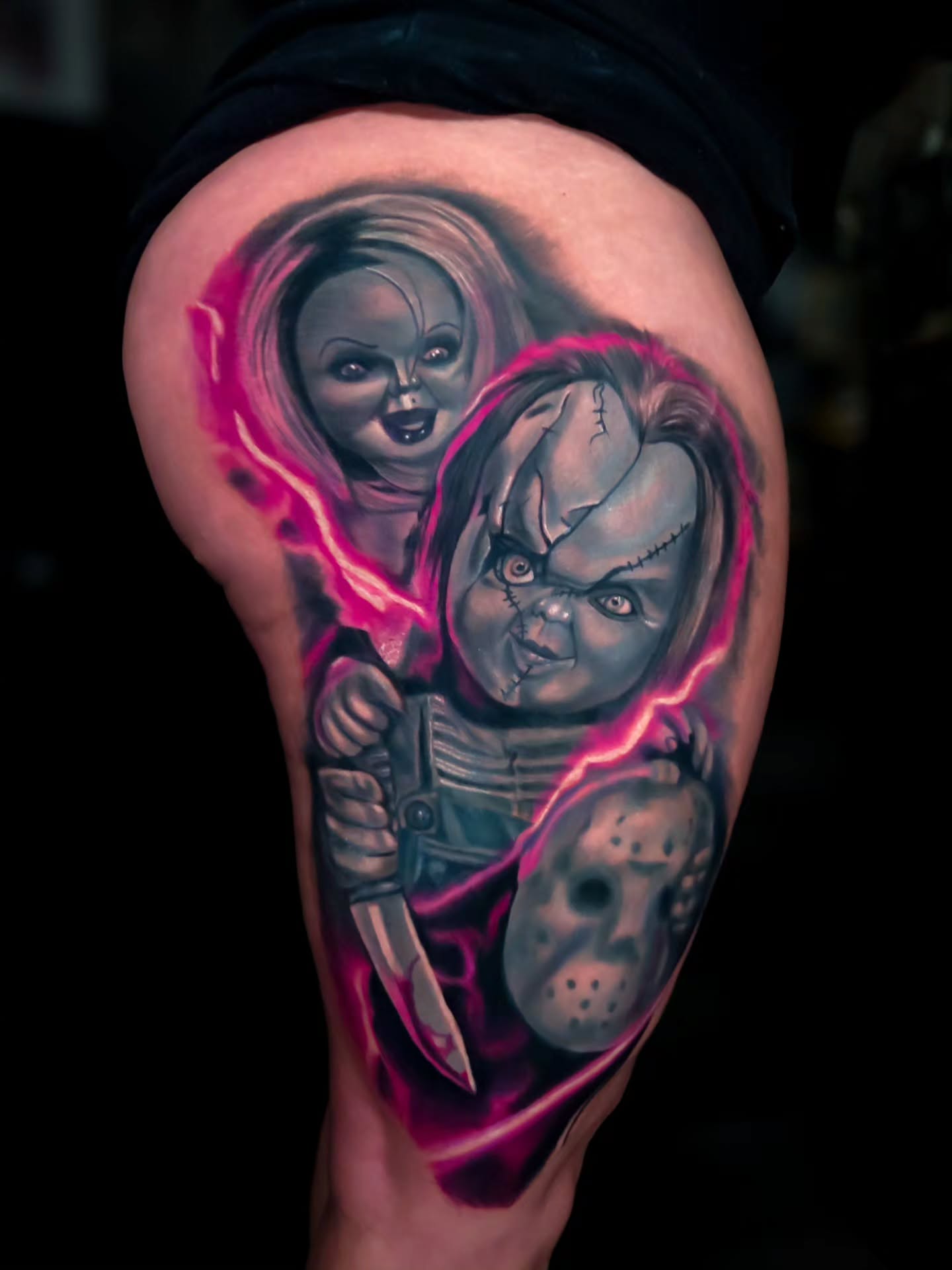 Chucky doll realism tattoo on the thigh by Color Realism Tattoos - Metro Detroit