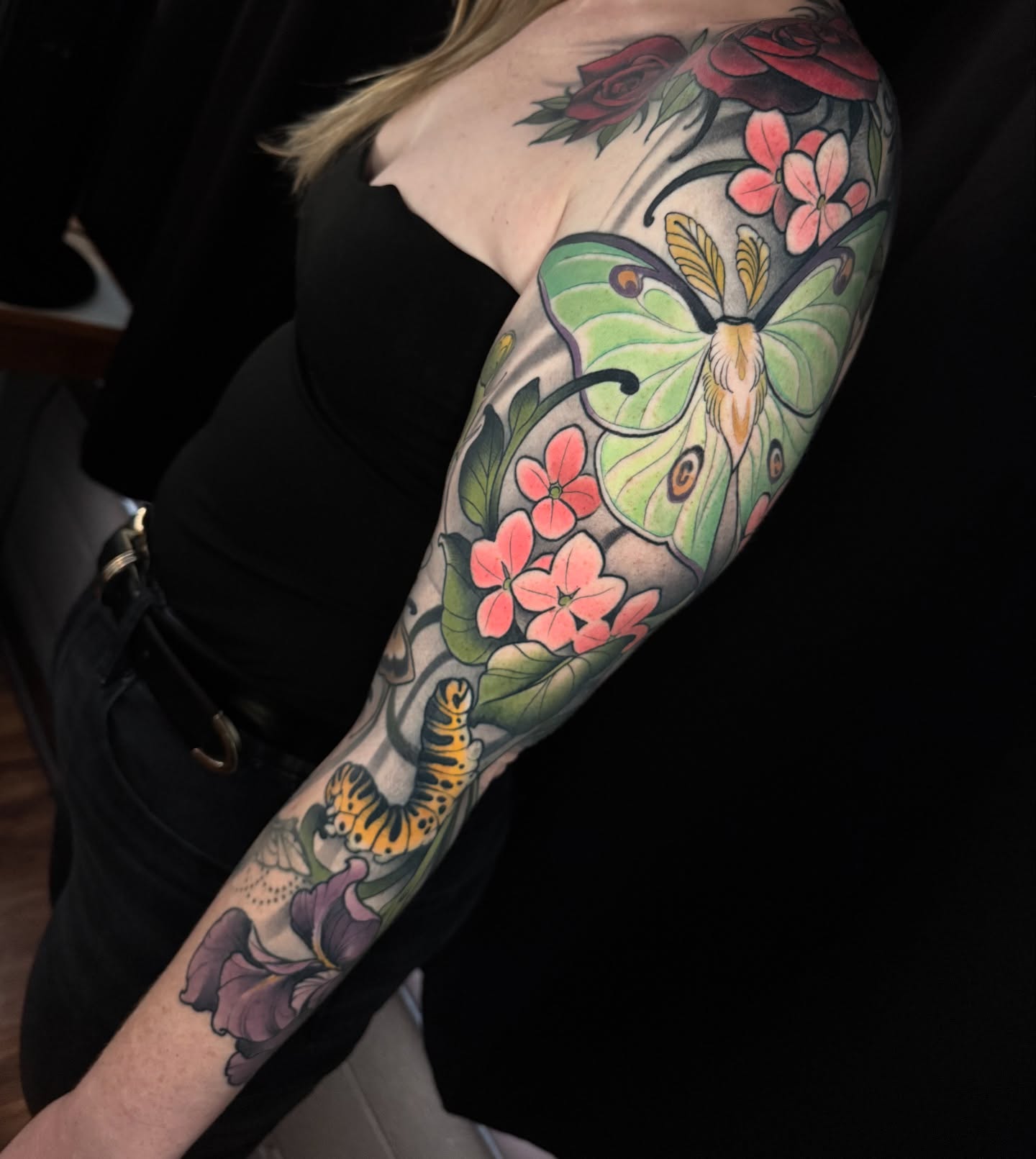 Butterfly and flowers new school tattoo on the forearm by Freddie Brown, Lombard, IL