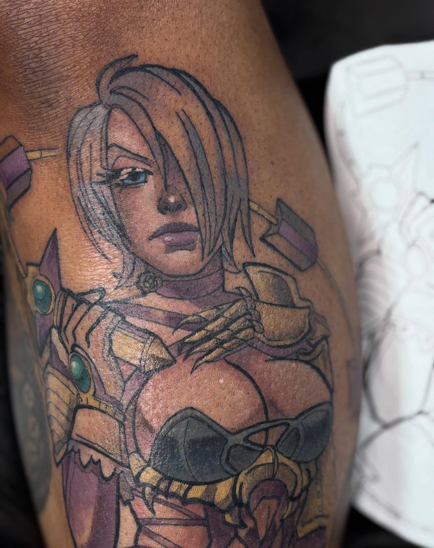 Female warrior realism tattoo on the thigh by Gabby