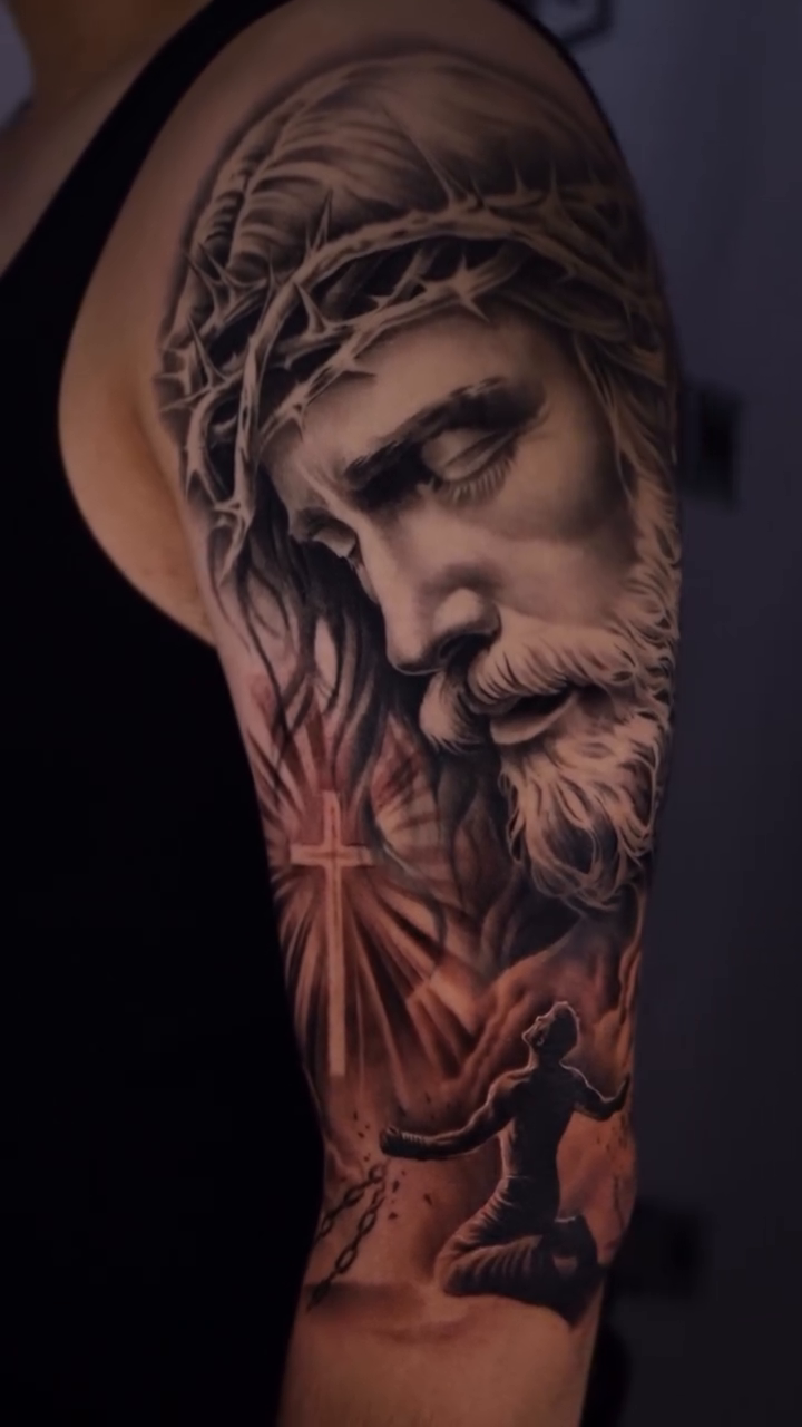 Jesus Christ and a praying figure realism tattoo by Anthony Maya