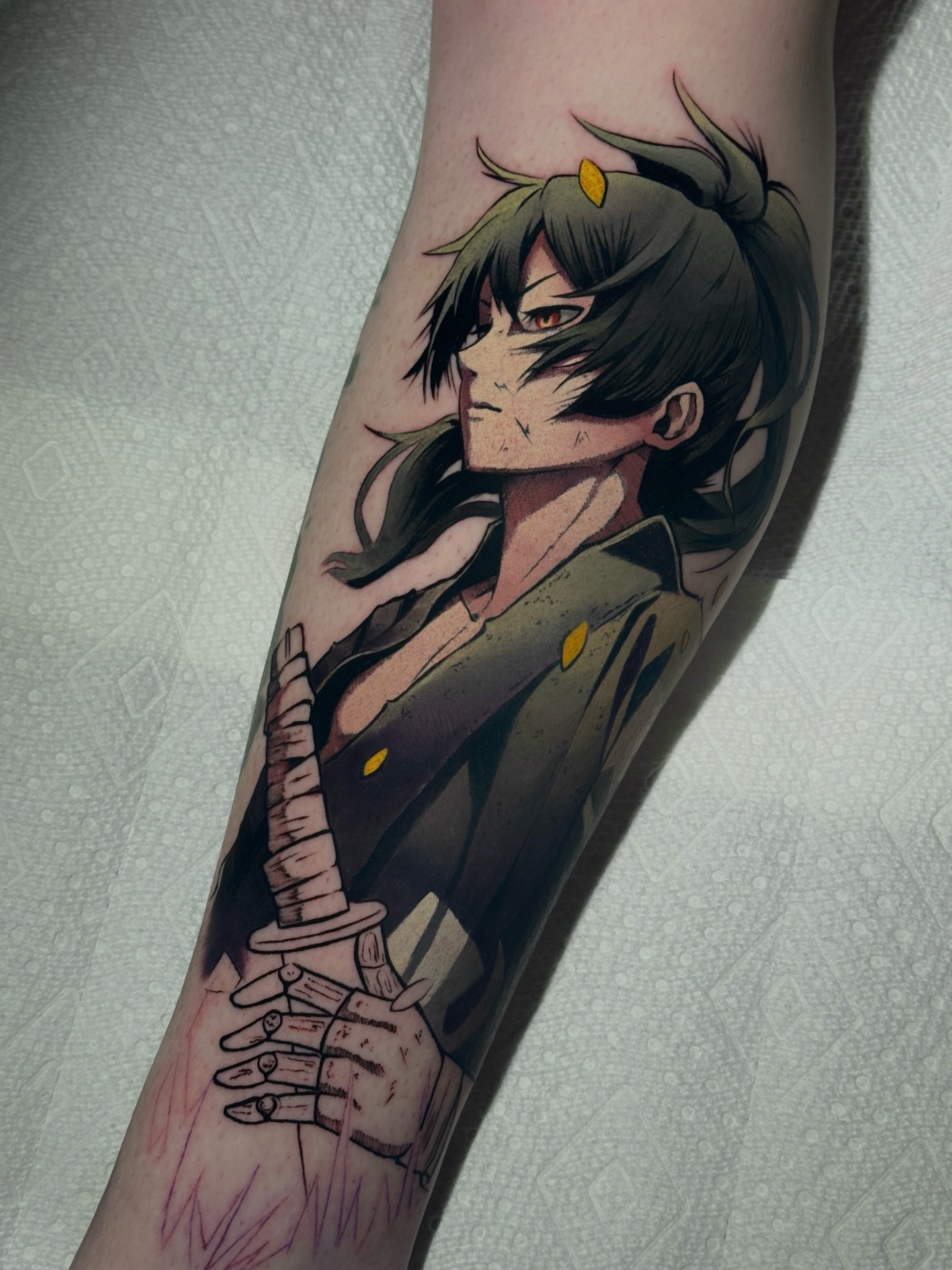 Anime character anime tattoo on the forearm by Bee Rye