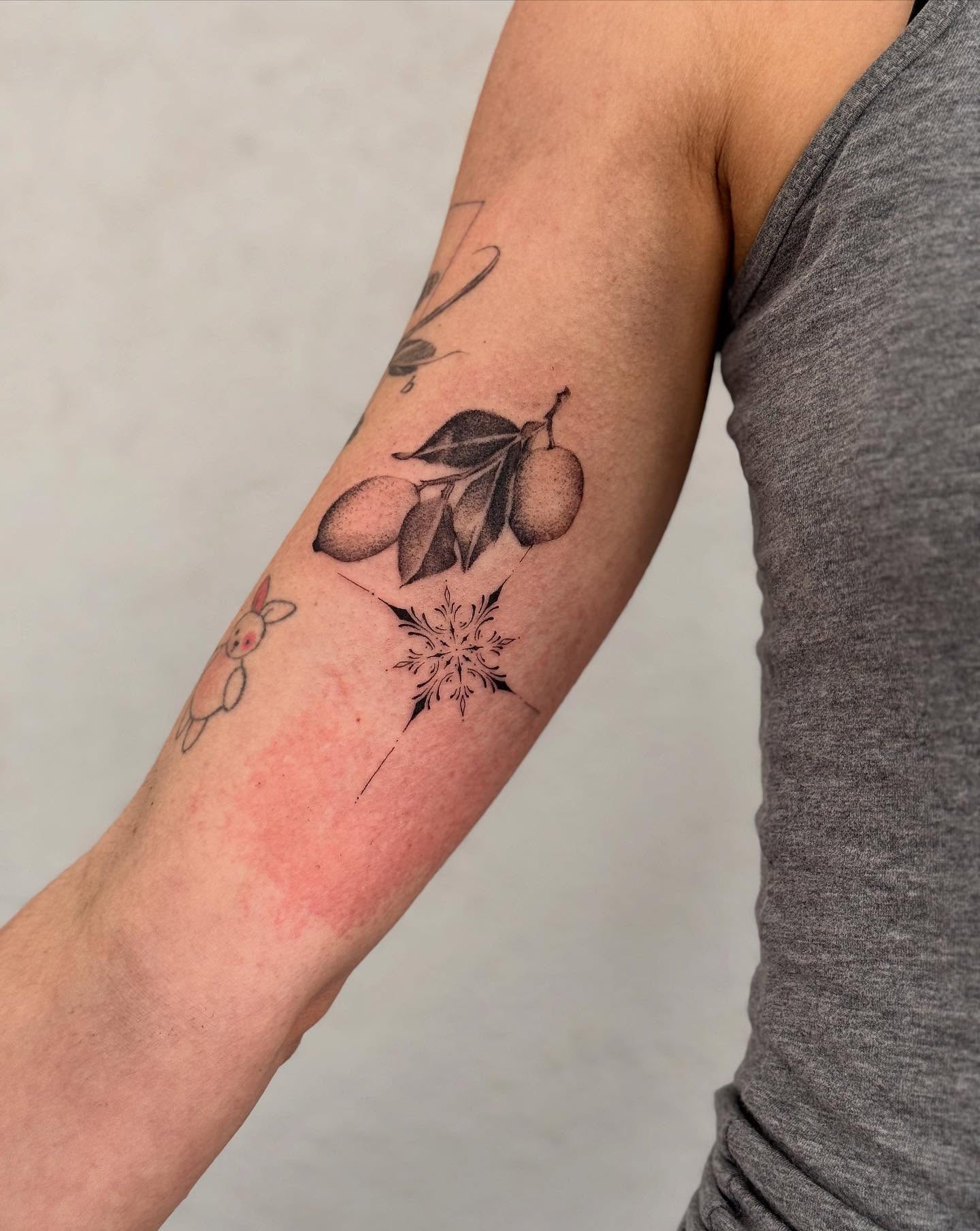 Fruit branch black and grey tattoo on the forearm by Karina ⋆⭒˚.⋆