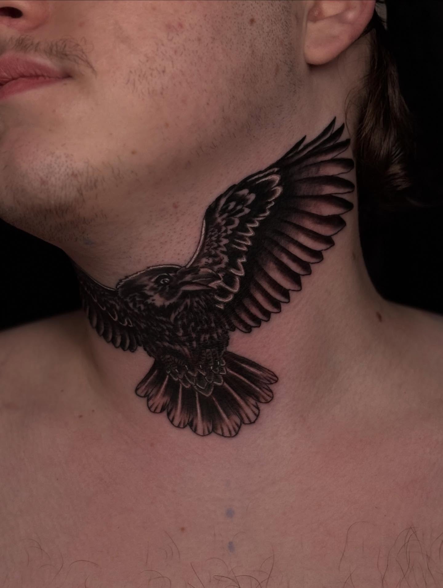 Eagle black and grey tattoo on the neck by Jacob - Tattoo Artist