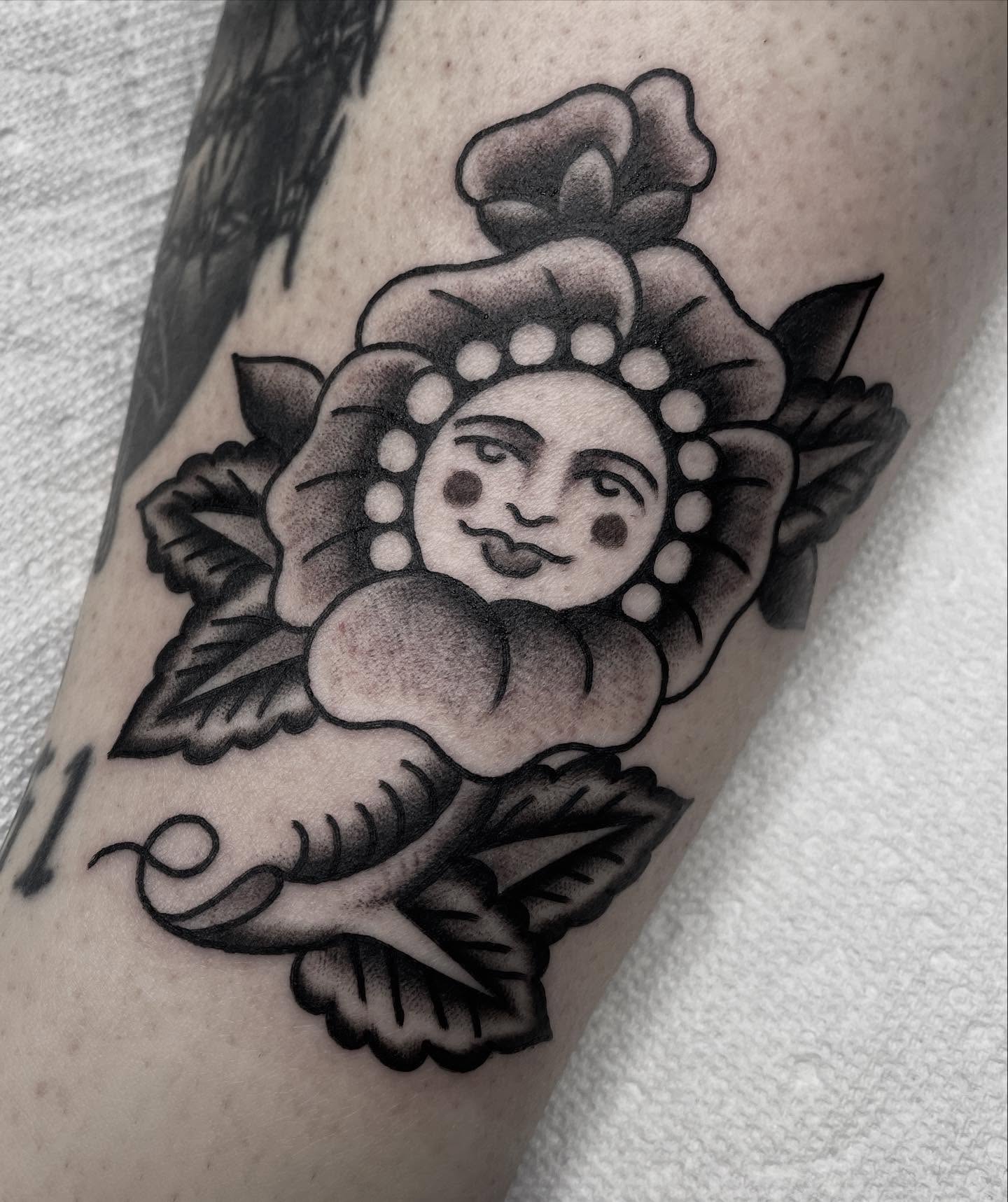 Sunflower American traditional tattoo on the forearm by Kat, Sacramento, California