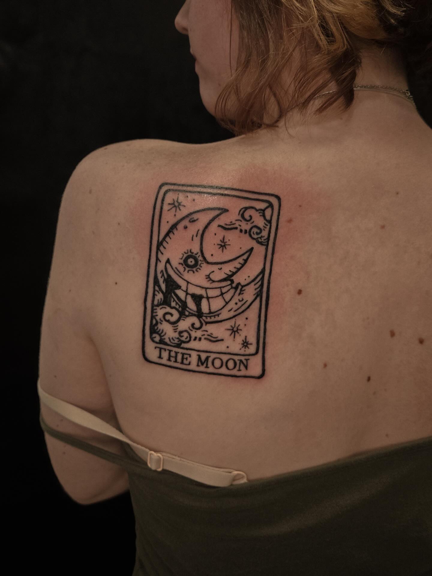 The moon black and grey tattoo on the back by ashley blyght
