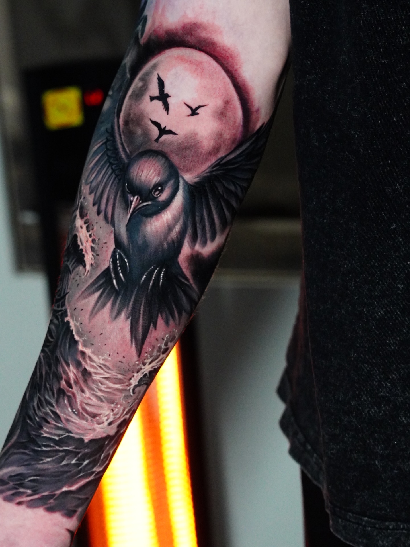 Bird and moon realism tattoo on the forearm by Angel Gonzalez
