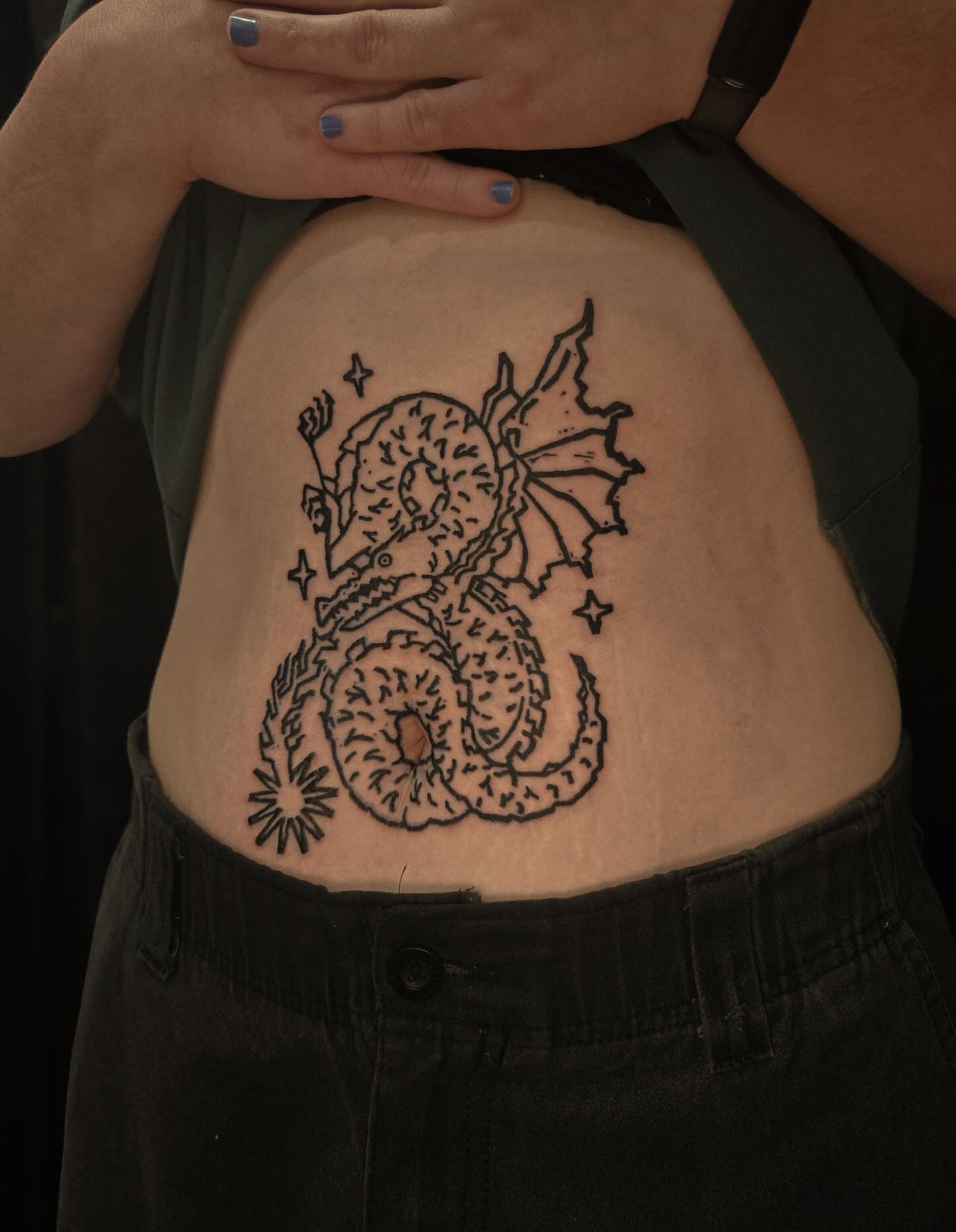 Dragon and moon black and grey tattoo on the torso by ashley blyght