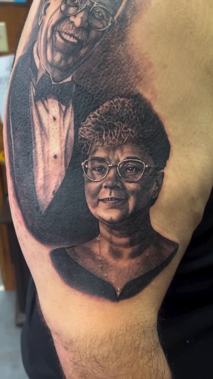 Elderly couple portrait realism tattoo by Adam Zgorliski_STStattoo