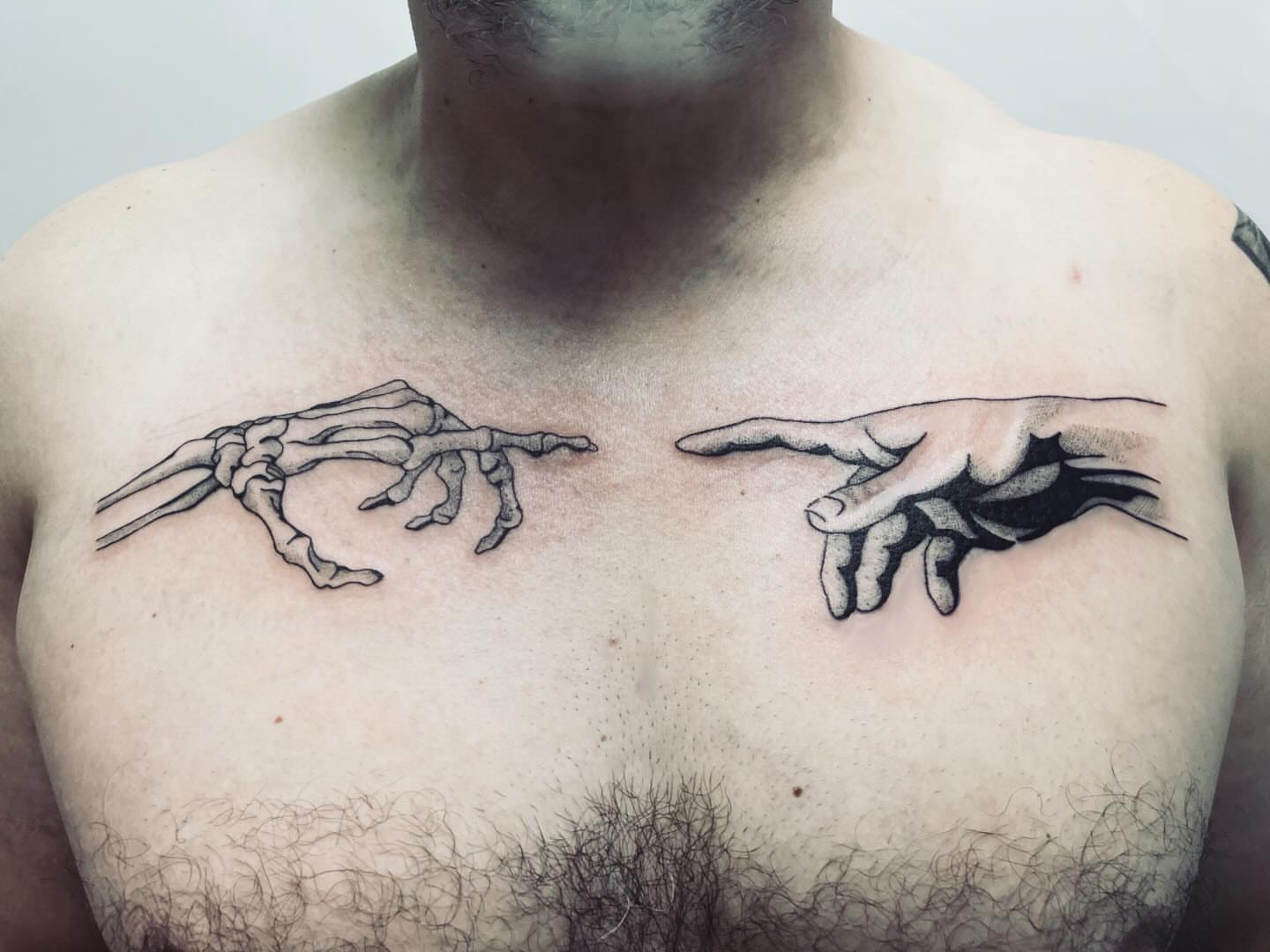 Hands realism tattoo on the chest by vivian