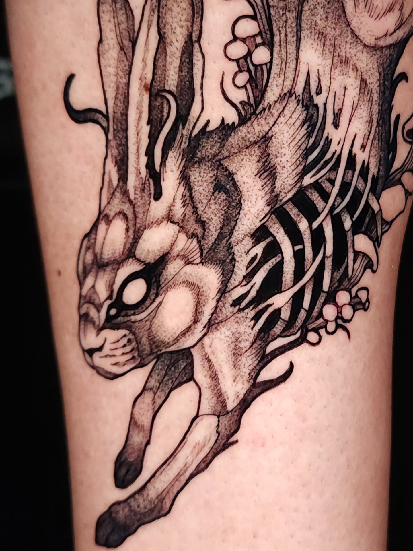 Rabbit dark realism tattoo on the forearm by Mario Romero