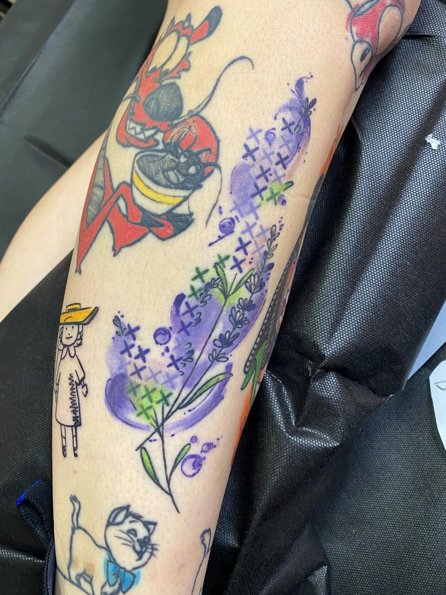 Cat and flowers watercolor tattoo on the forearm by @kaitlin.tattoos, Richmond, Virginia