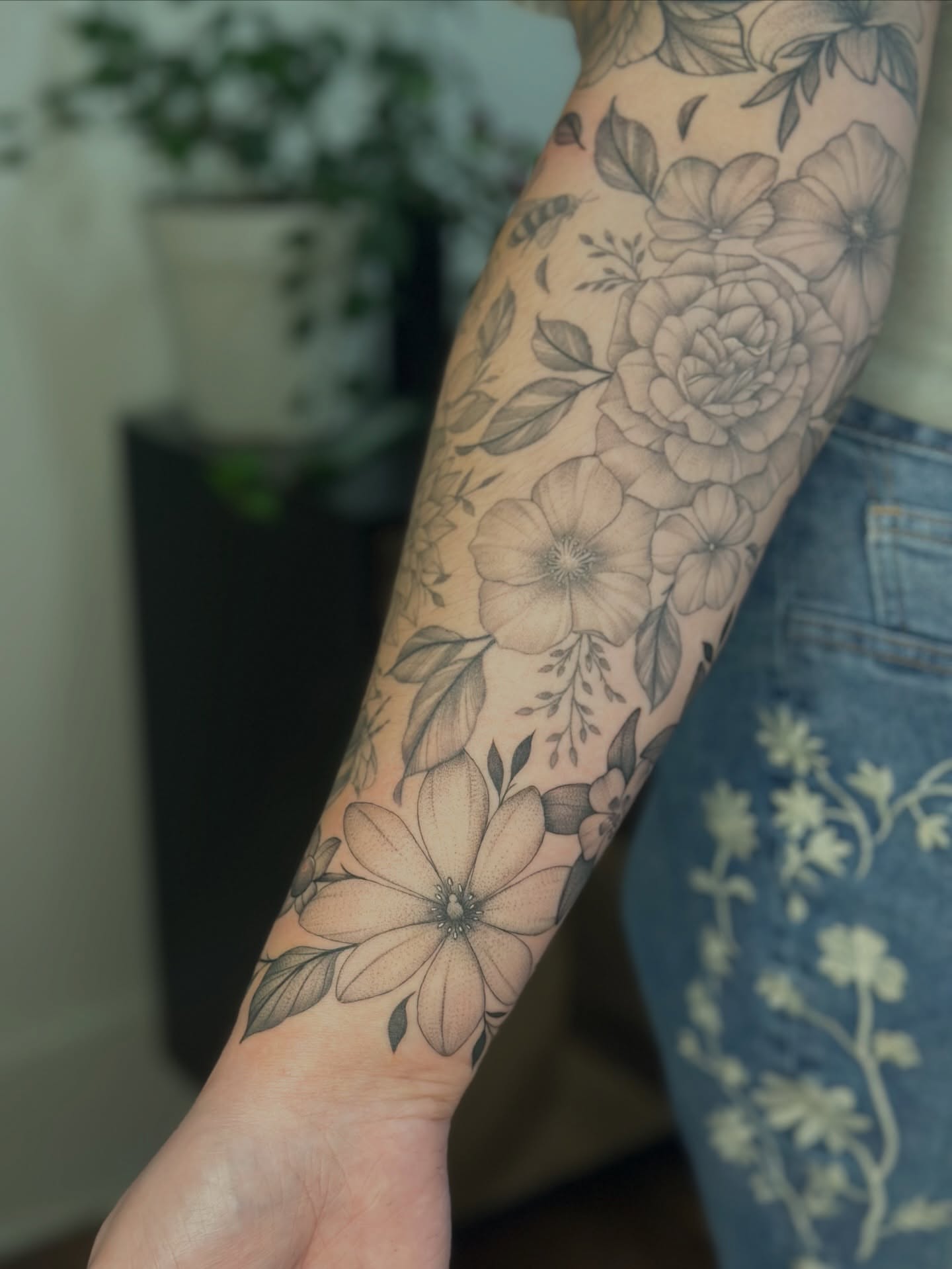 Floral bouquet black and grey tattoo on the forearm by ๐
๐๐๐๐๐ ๐๐๐๐๐๐