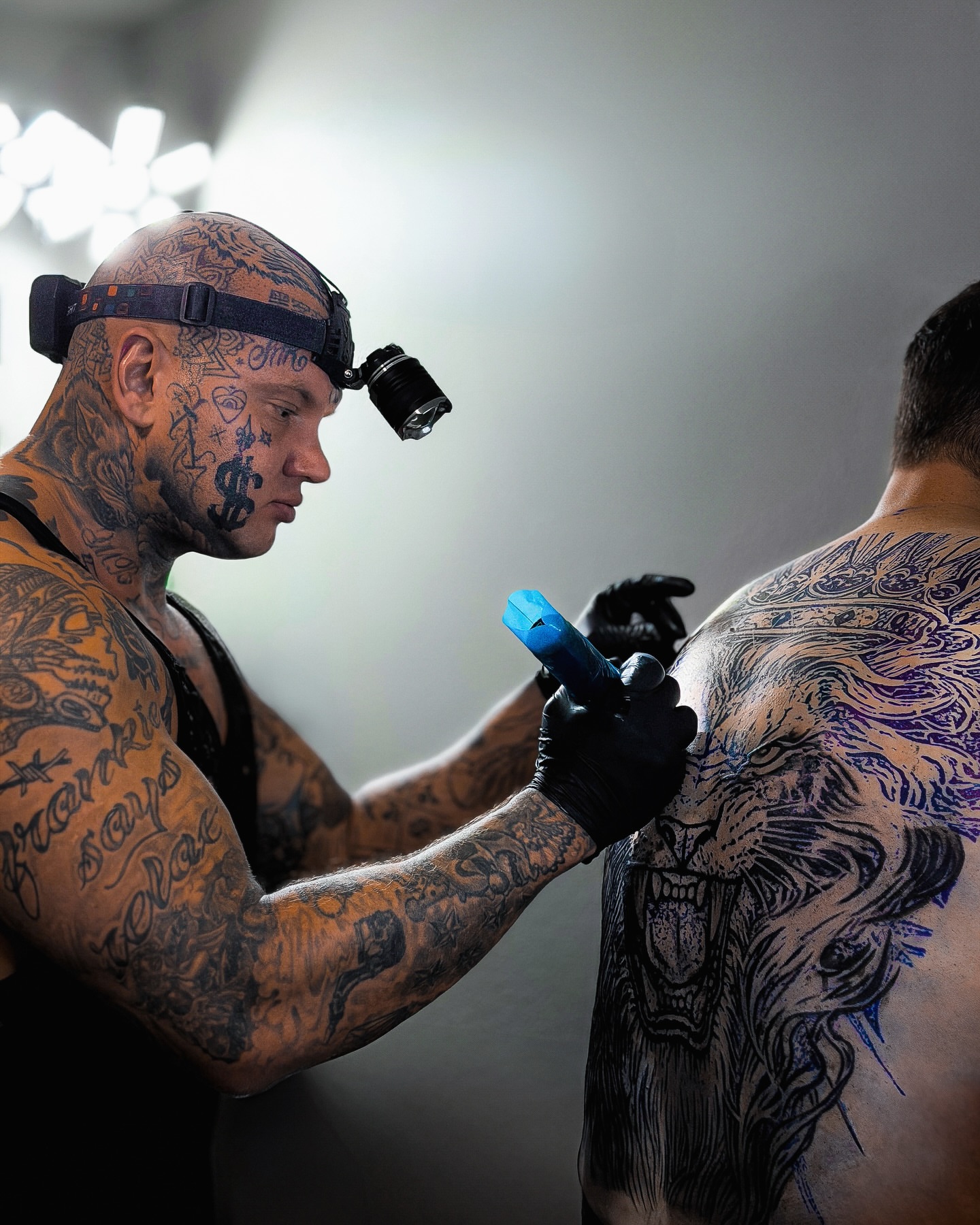 Lion black and grey tattoo on the back by Mak$ Brand