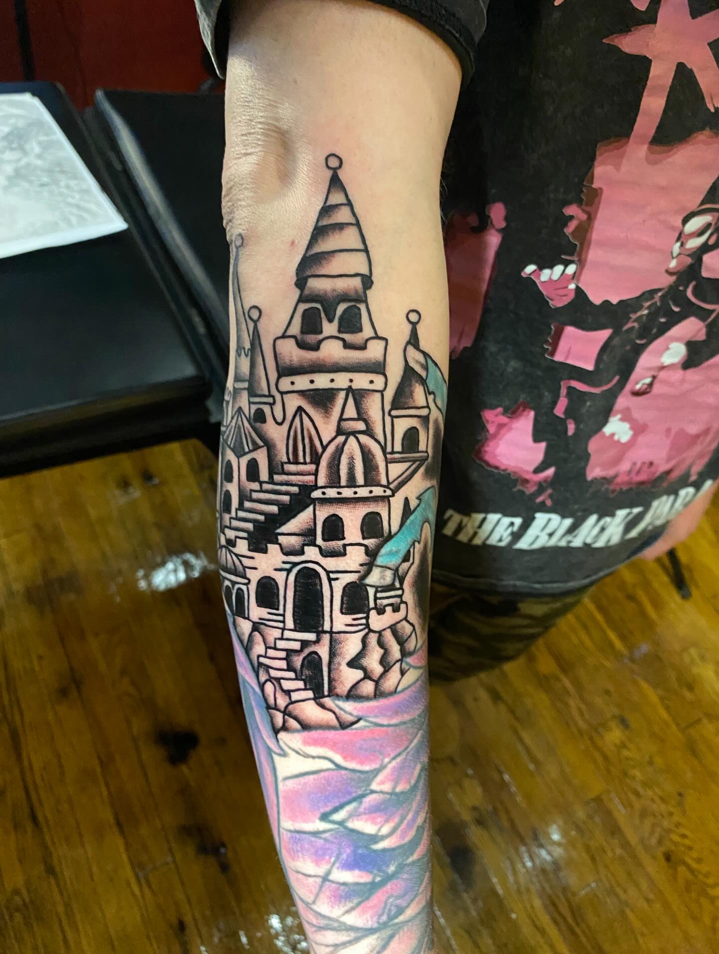 Castle dotwork tattoo on the forearm by Tommy O'Connell
