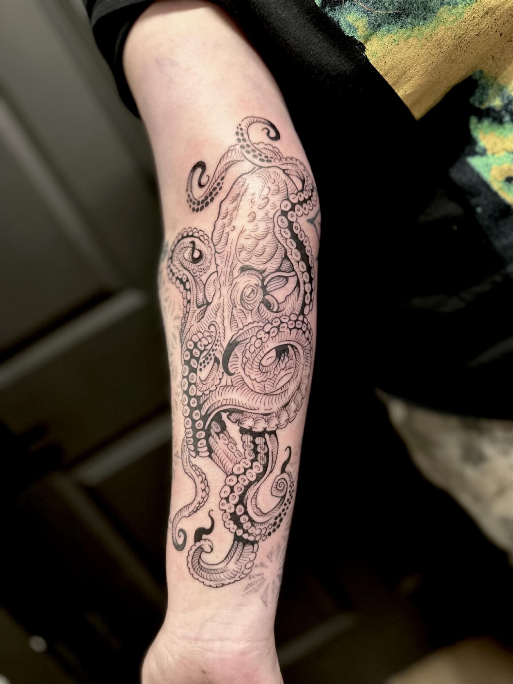 Octopus black and grey tattoo on the forearm by Ciera High l Tattoo Artist