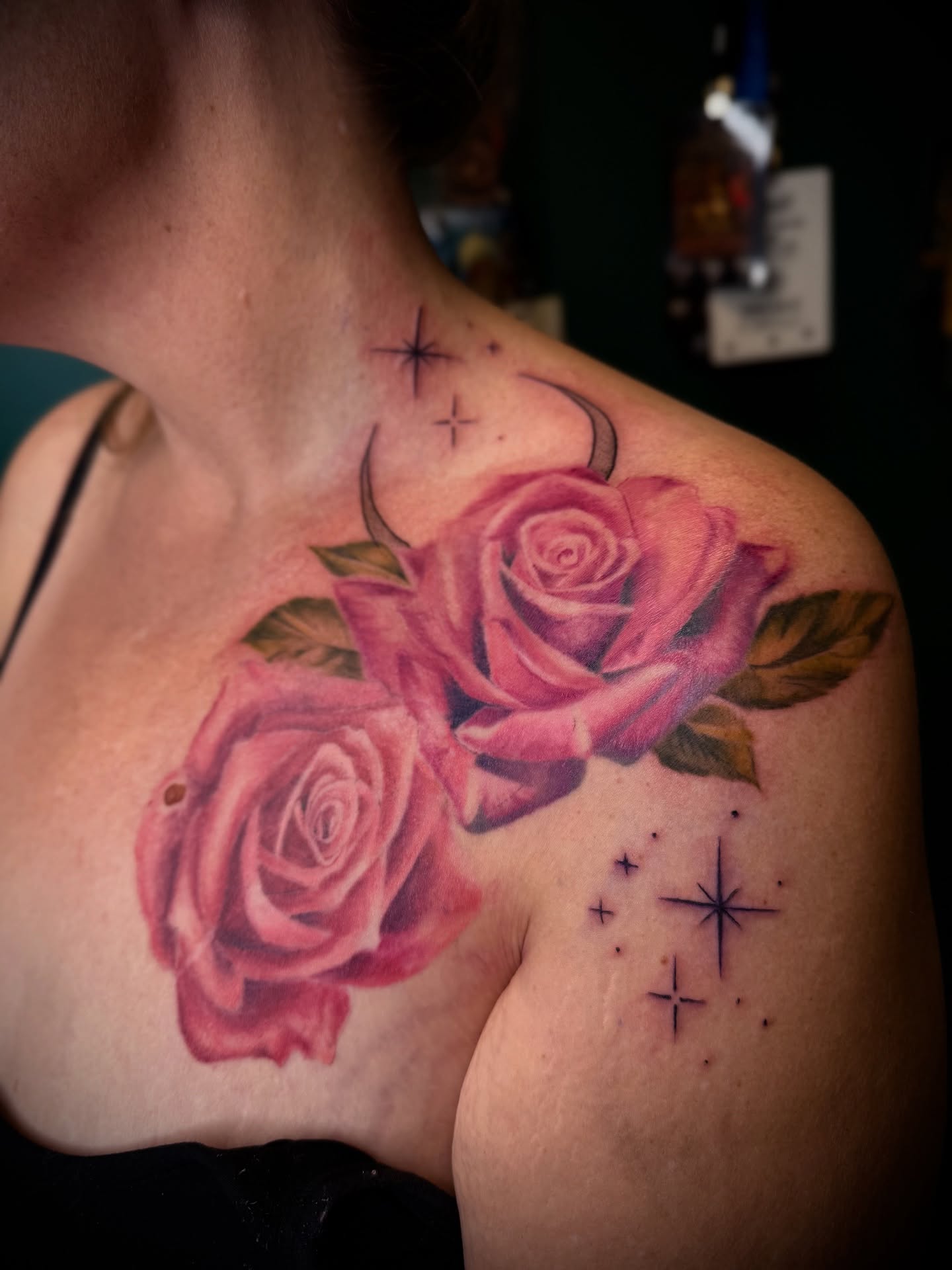 Roses realism tattoo on the shoulder by Jennifer Contreras
