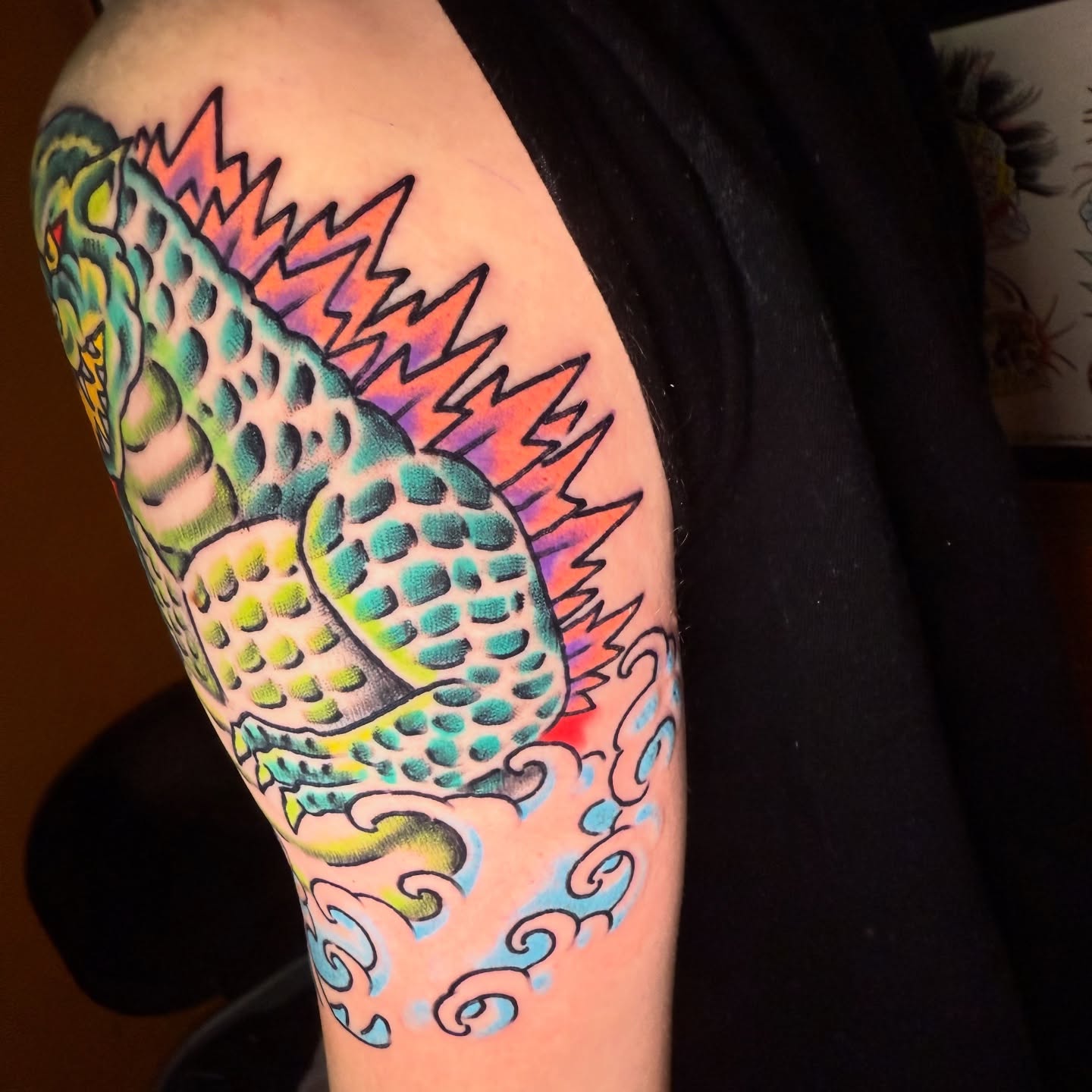Serpent American traditional tattoo on the forearm by Mike Dunn