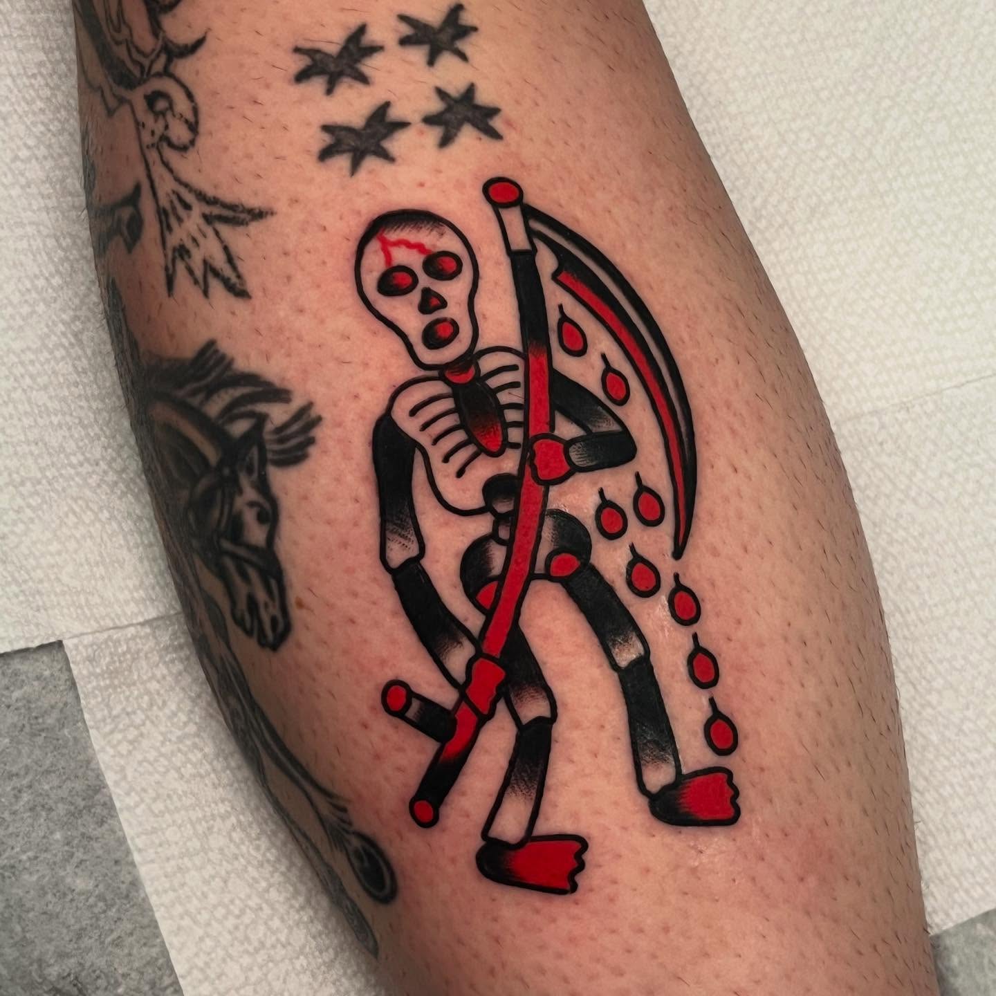 Reaper skeleton American traditional tattoo on the forearm by Rizzo
