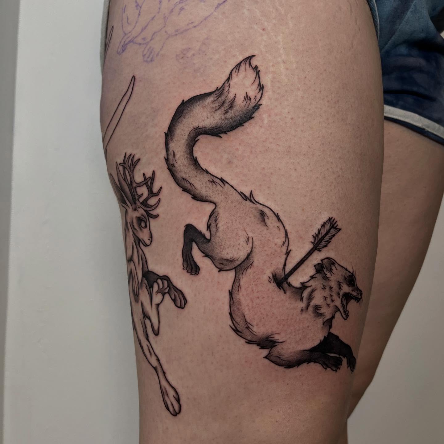 Fox hunting deer realism tattoo on the thigh by Ty’s Tattoos