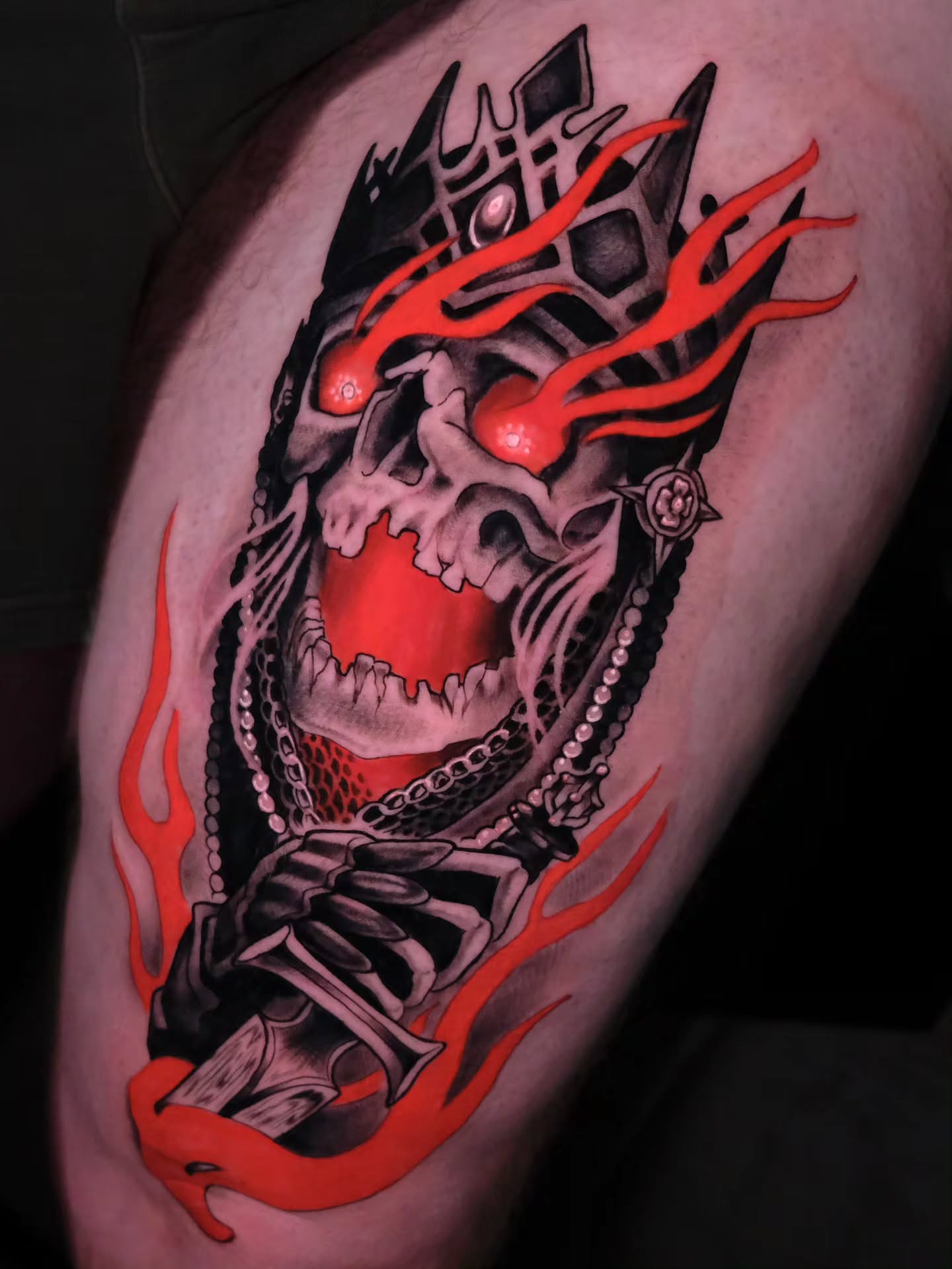 Skull with flames dark realism tattoo on the thigh by Tash  - Seattle Tattoo Artist