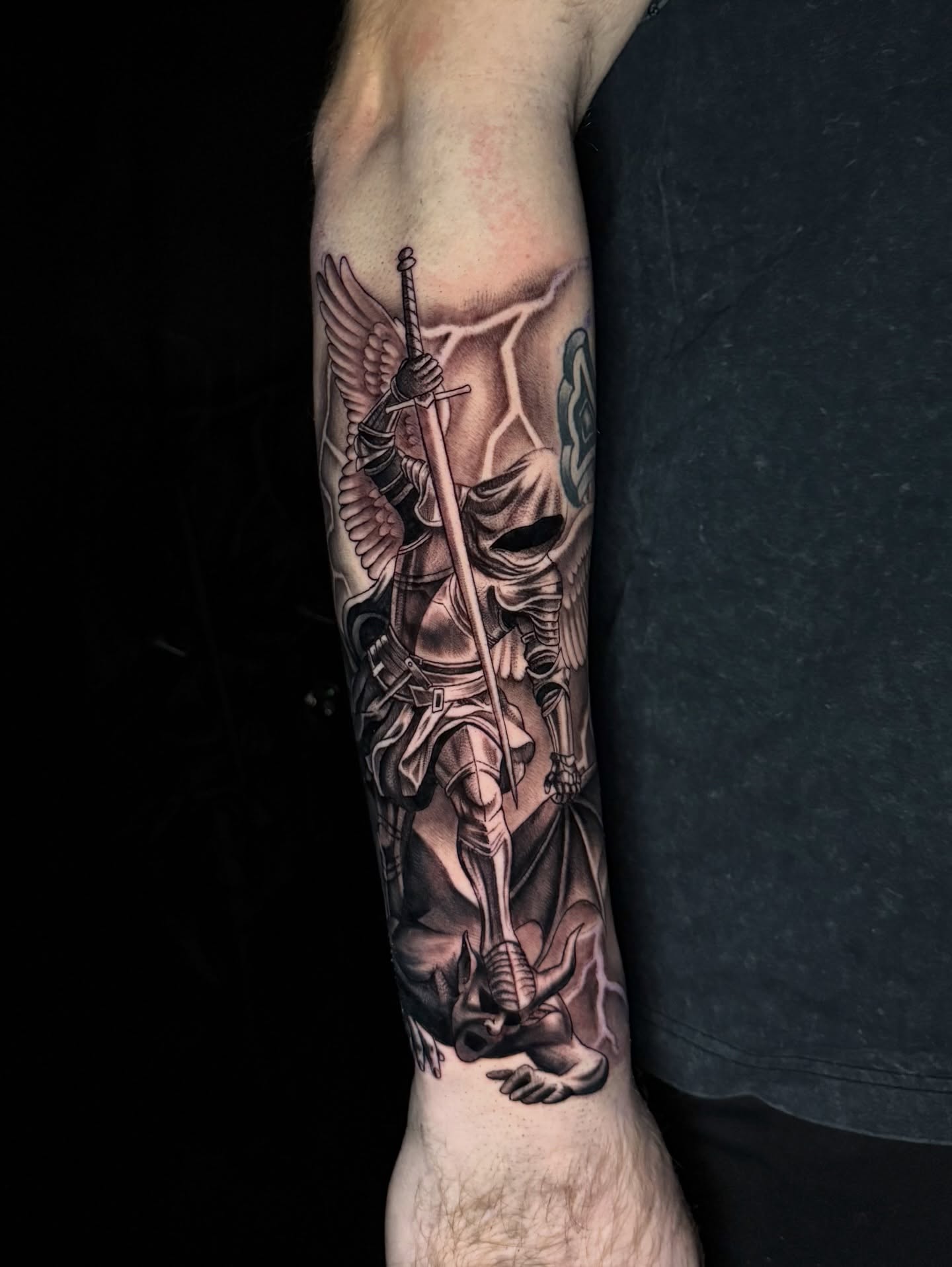 Angelic warrior realism tattoo on the forearm by Jesse Reip, Lakewood, Ohio