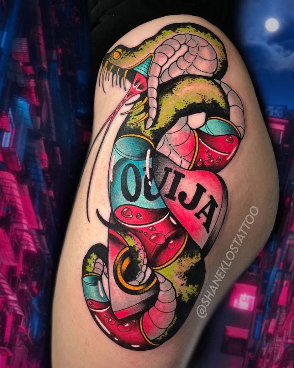 Ouija board snake American traditional tattoo on the thigh by Shane Klos