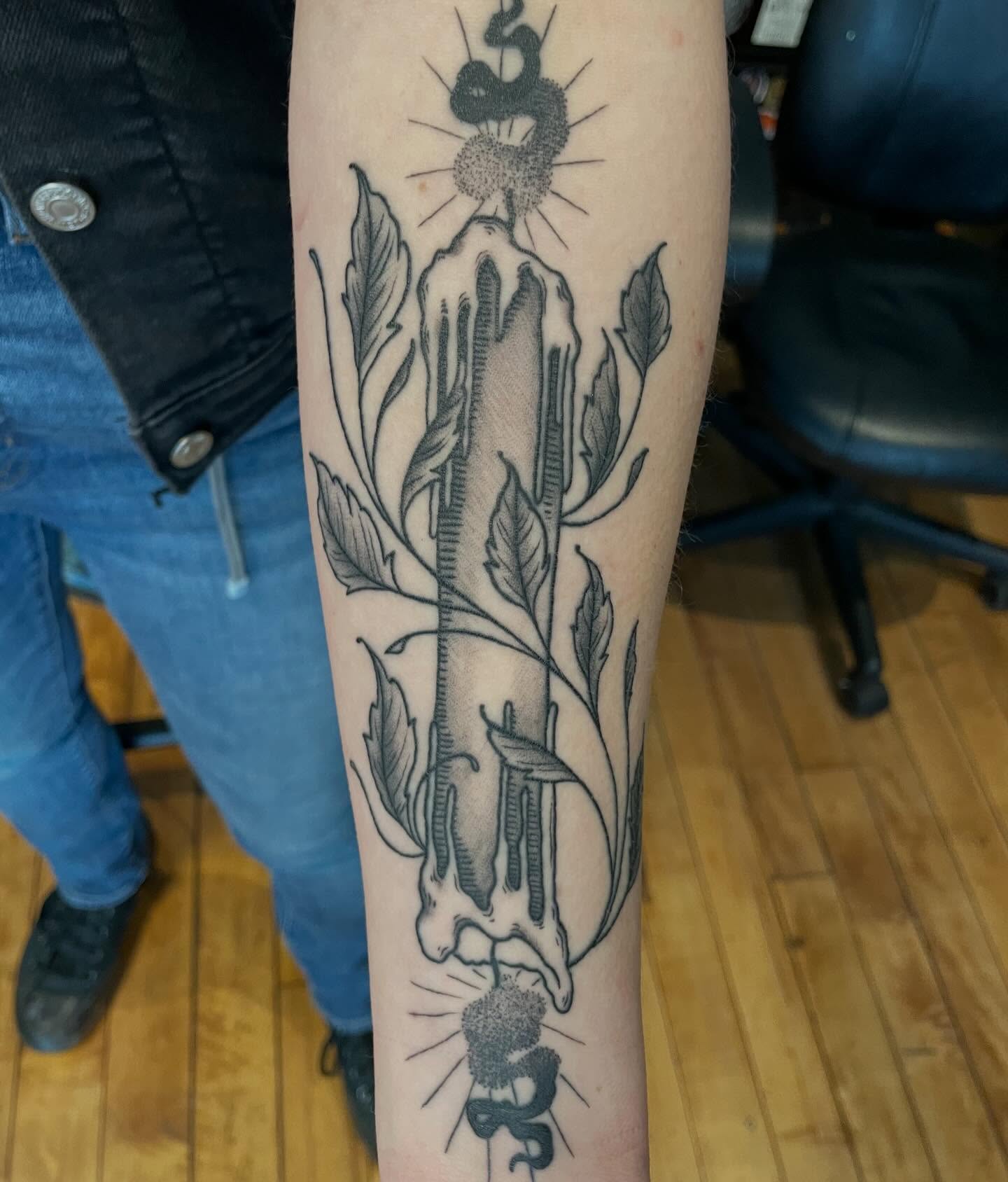 Hand with flower black and grey tattoo on the forearm by Lake Stephens, Richmond, Virginia