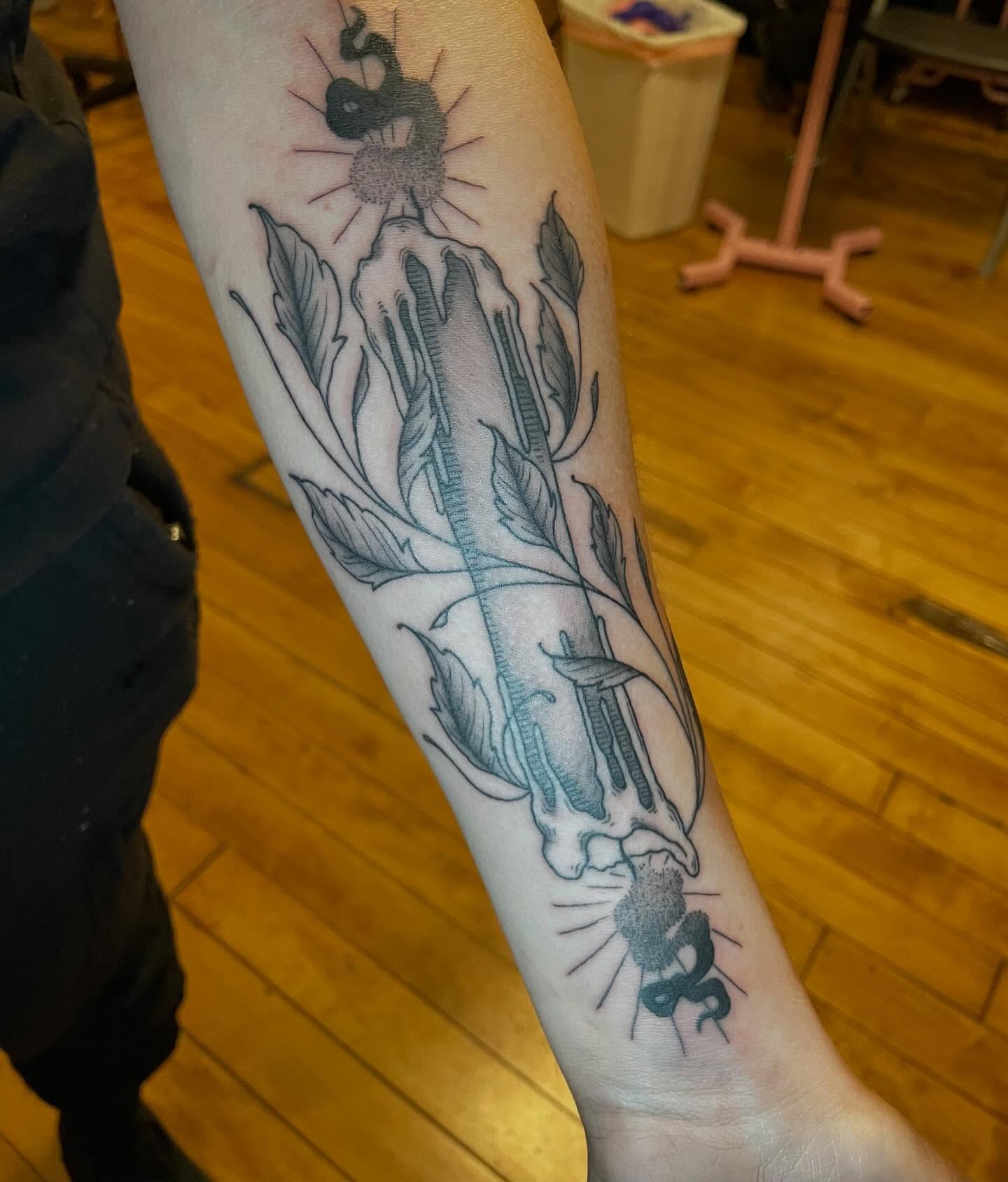 Snake and plant black and grey tattoo on the forearm by Lake Stephens, Richmond, Virginia