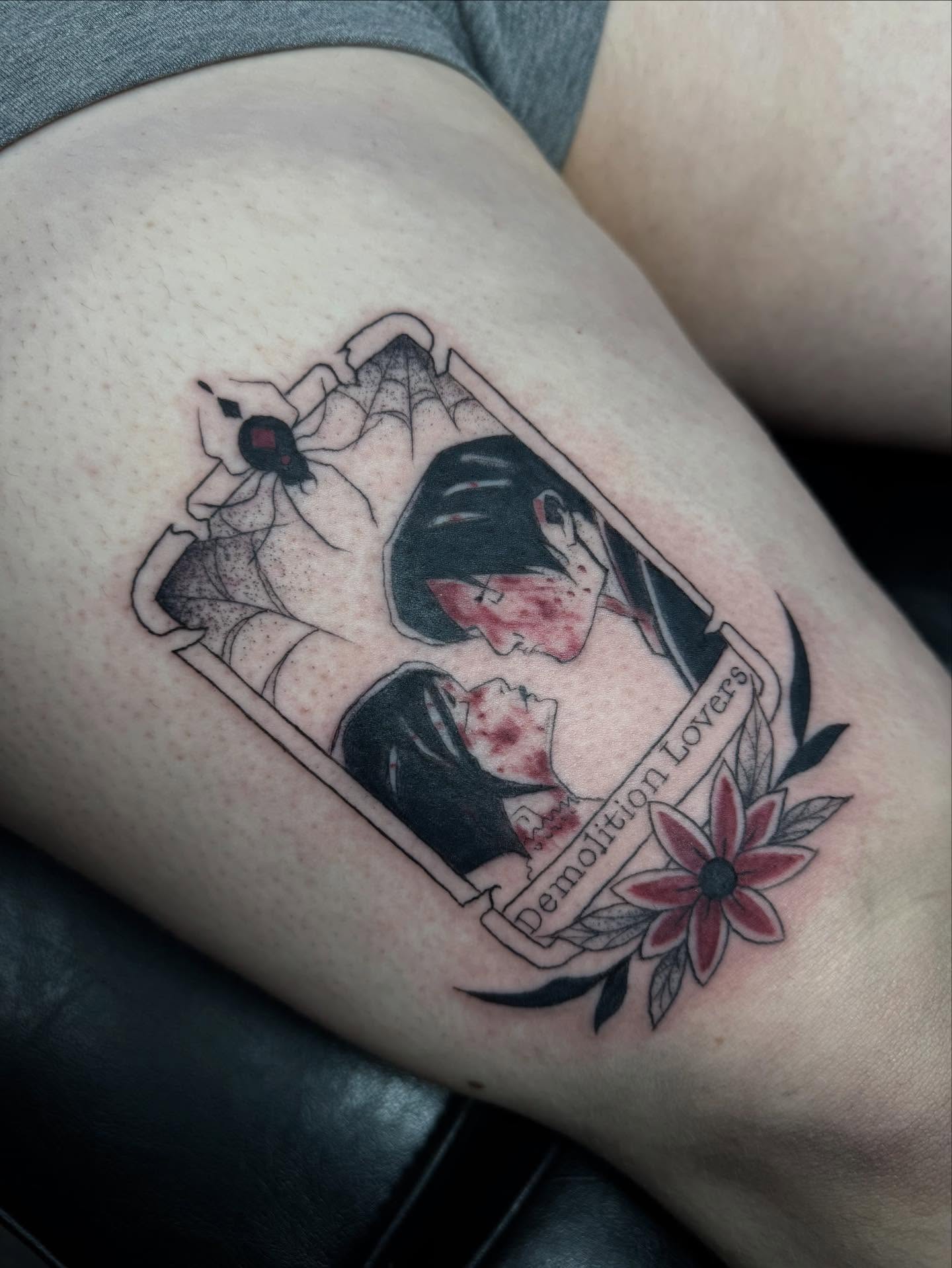 Demolition lovers neo-traditional tattoo on the thigh by olivia reed