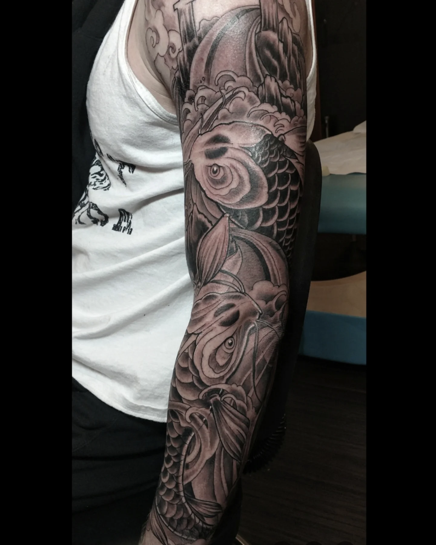 Koi fish and rose japanese irezumi tattoo on the forearm by Ashton Allen-Ruiz, Portland, Oregon