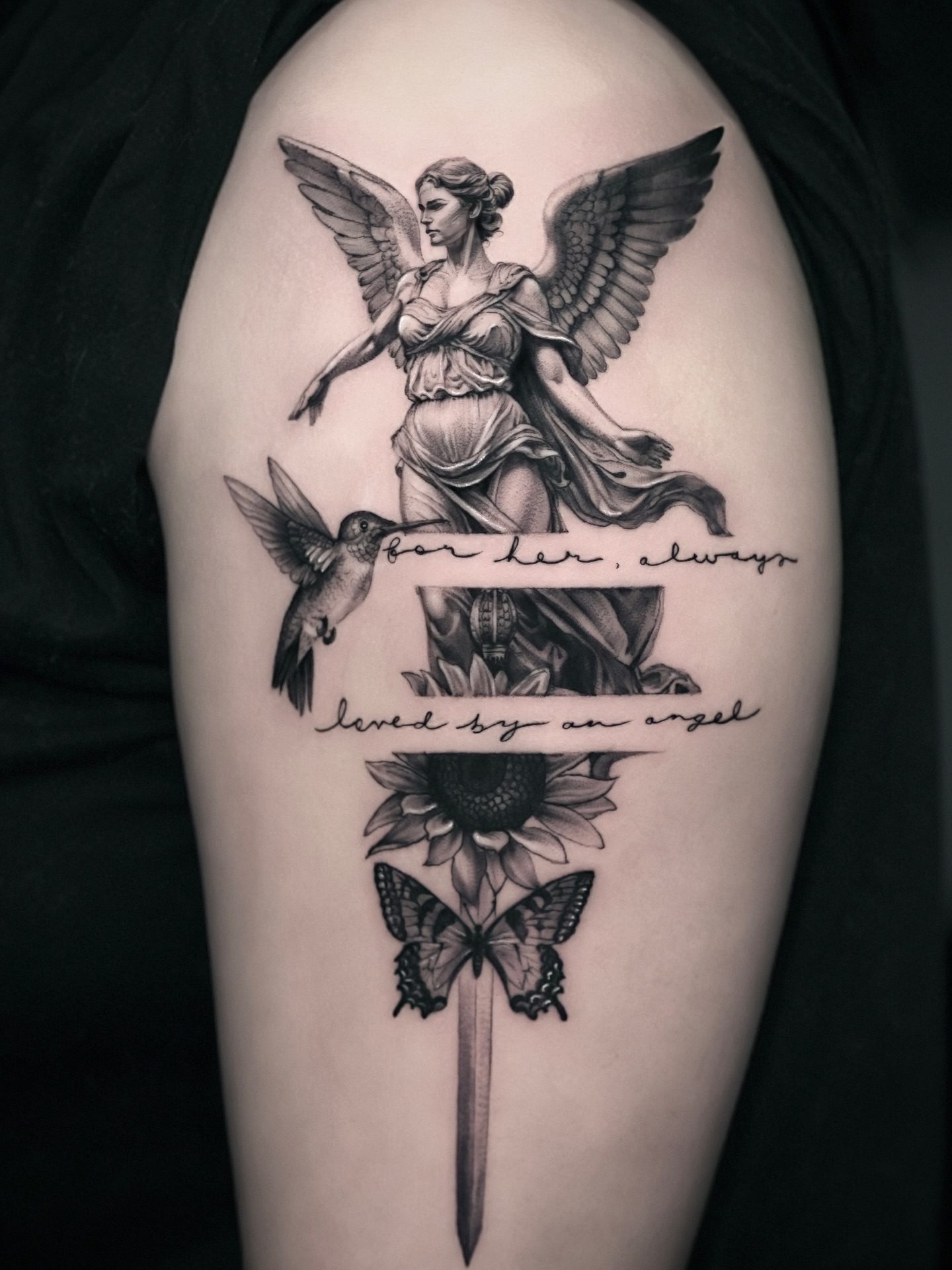 Statue with wings realism tattoo on the shoulder by Zonghuan Wu