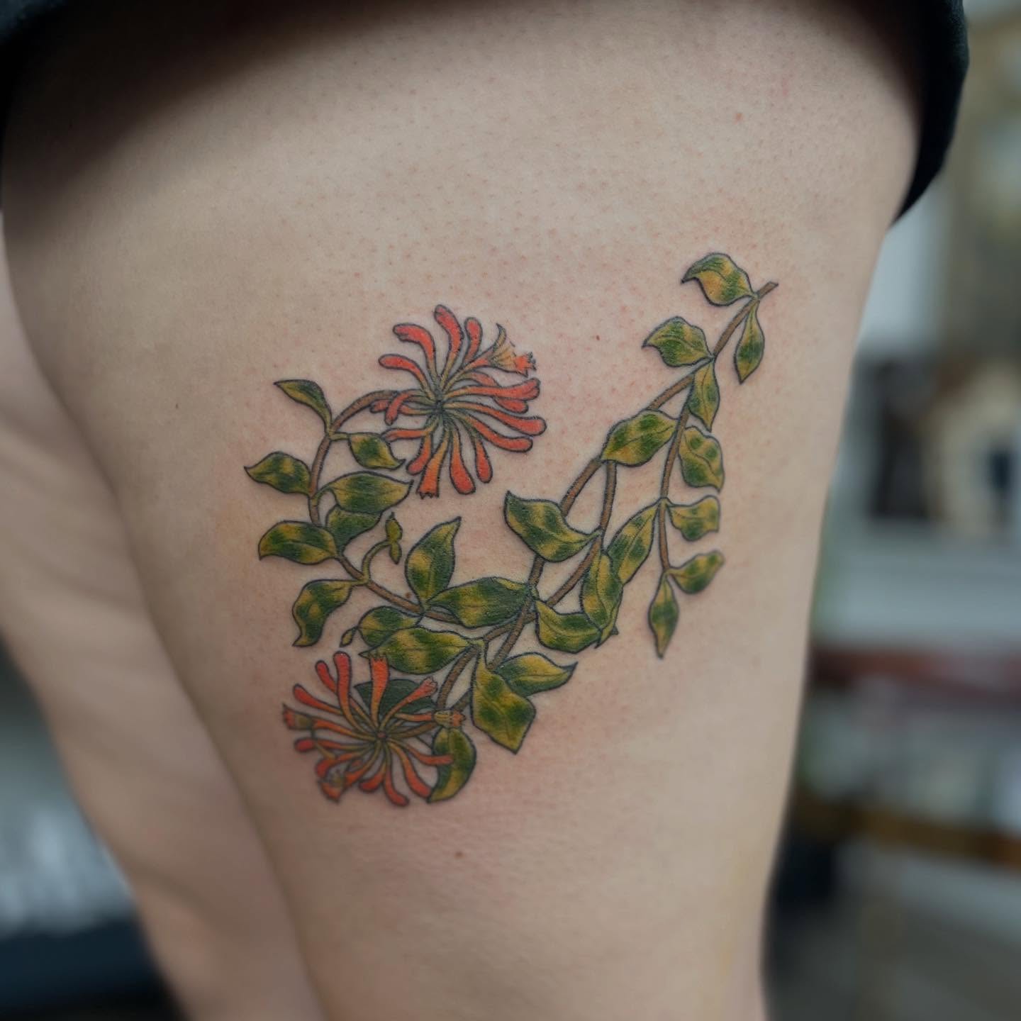 Flower vine American traditional tattoo on the thigh by Maddy Anthony