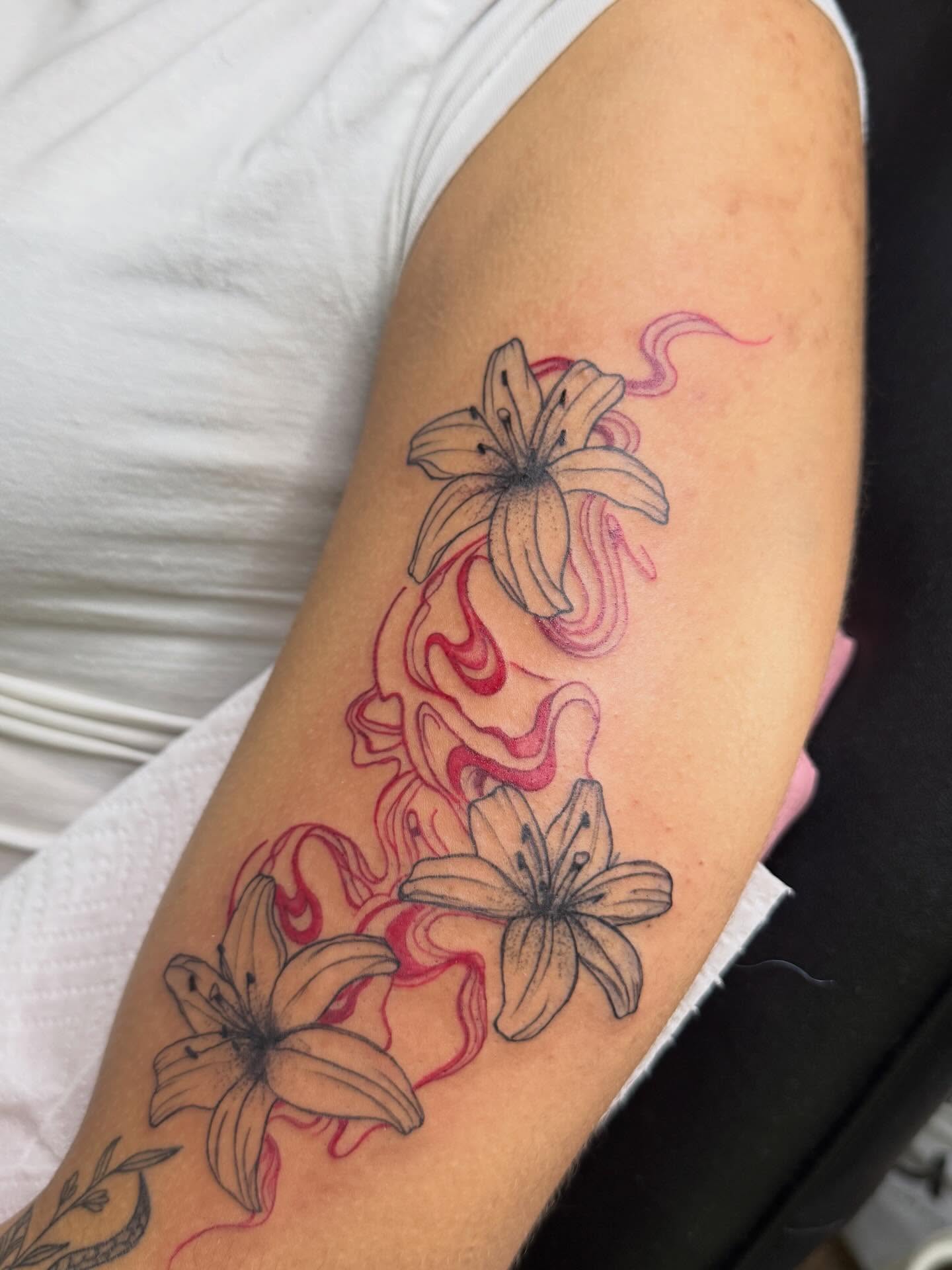 Lilies new school tattoo on the forearm by Destini