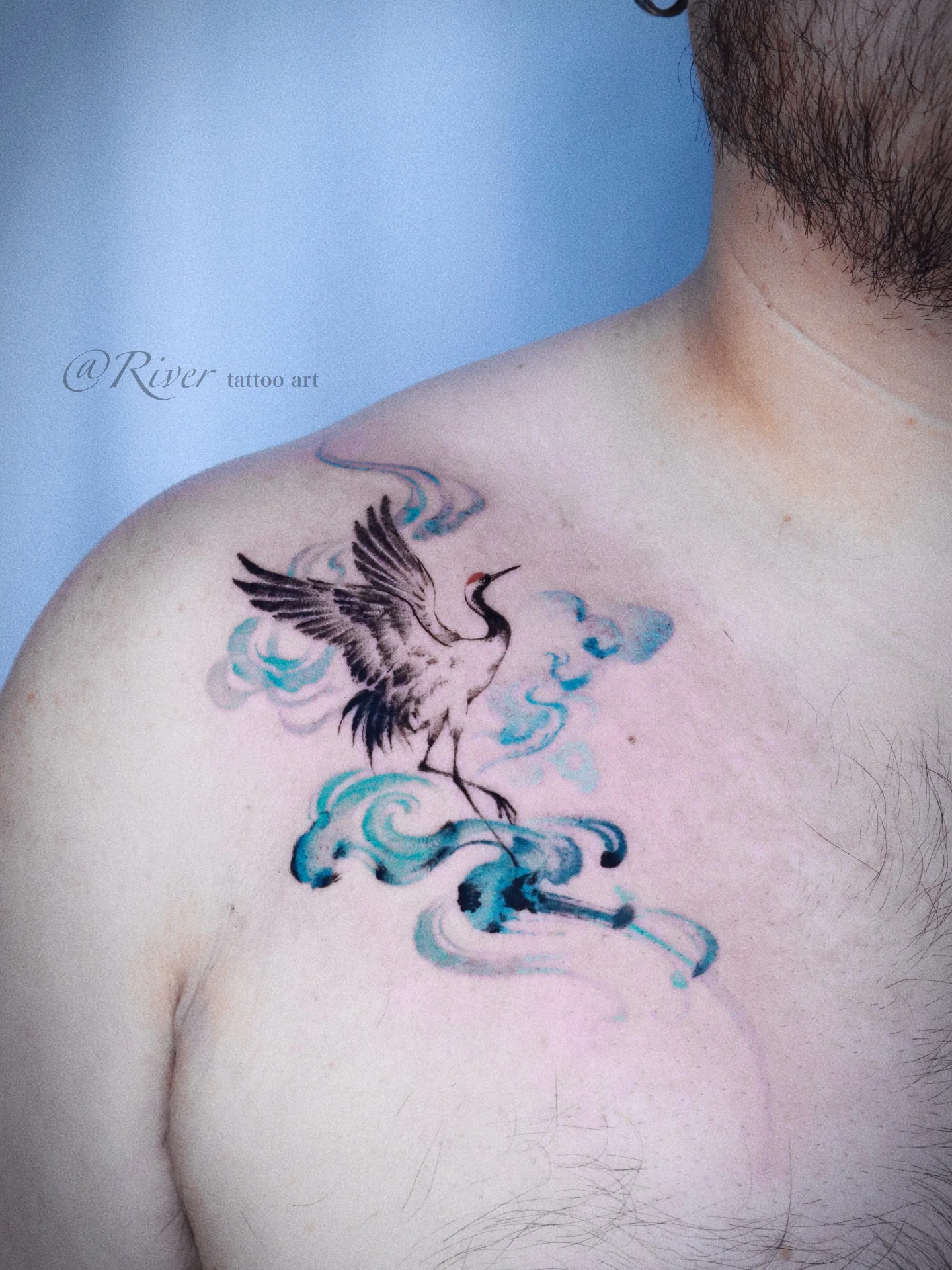 Crane watercolor tattoo on the chest by River