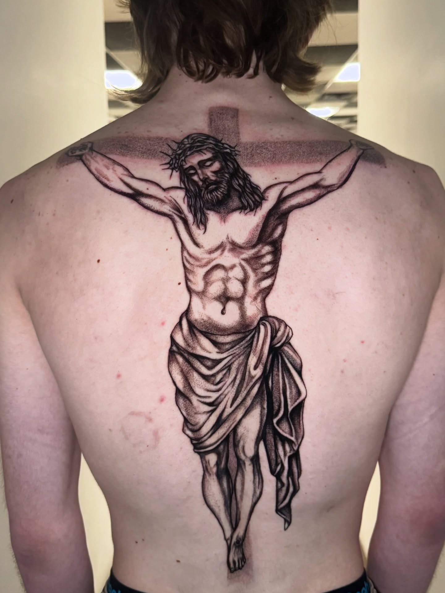 Crucifixion scene dotwork tattoo on the back by Shushe ๐จ๐ด