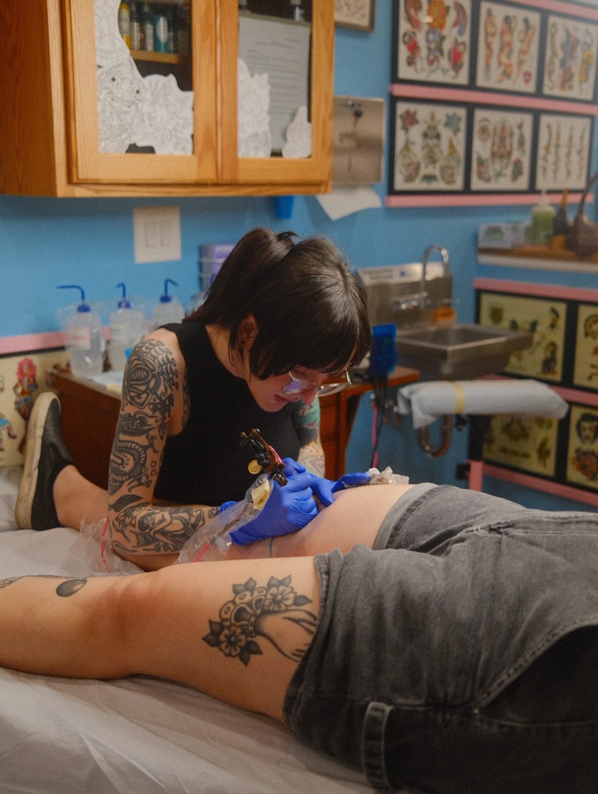 Floral design American traditional tattoo on the leg by B