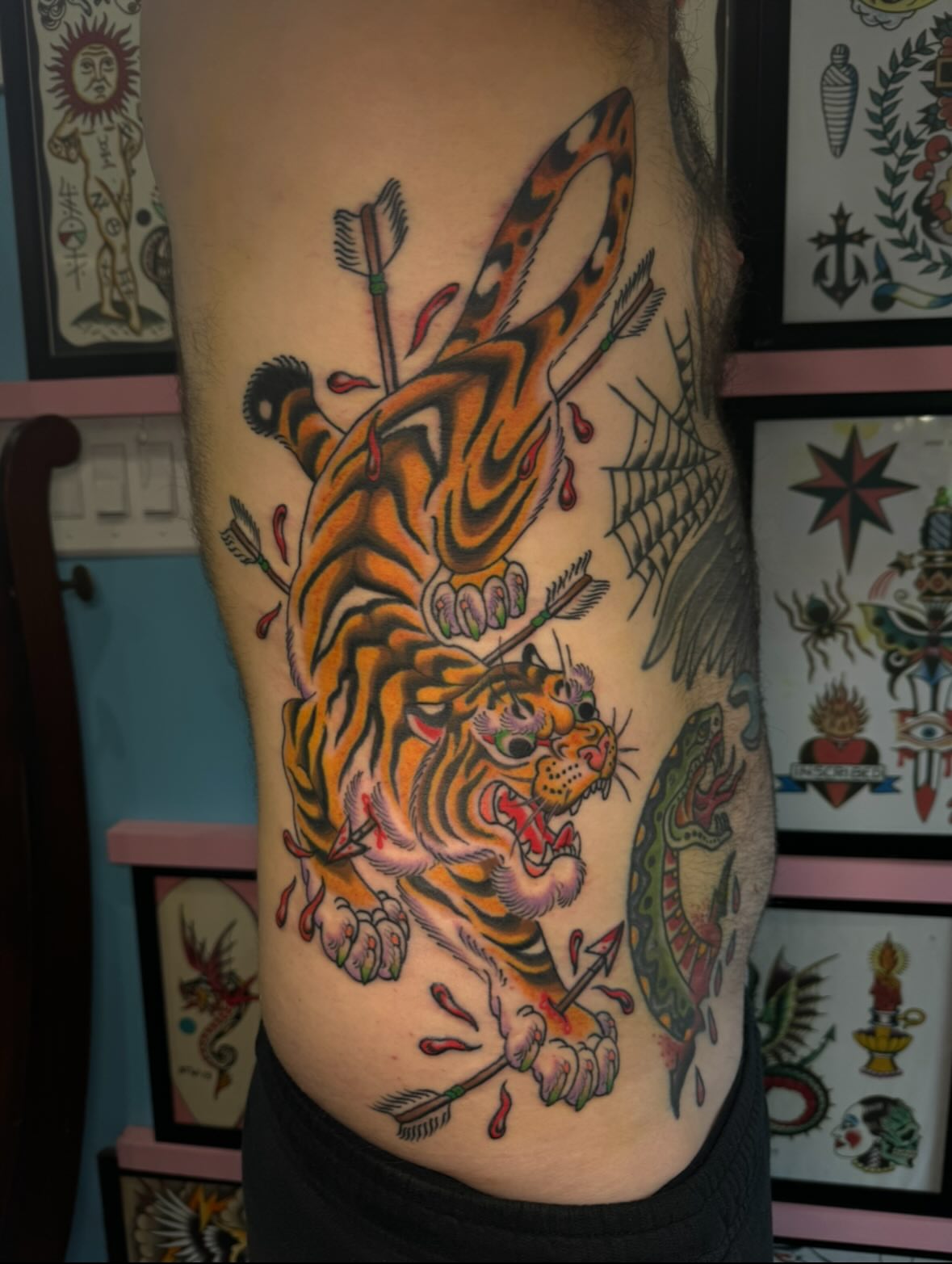 Tiger and snake American traditional tattoo on the thigh by B