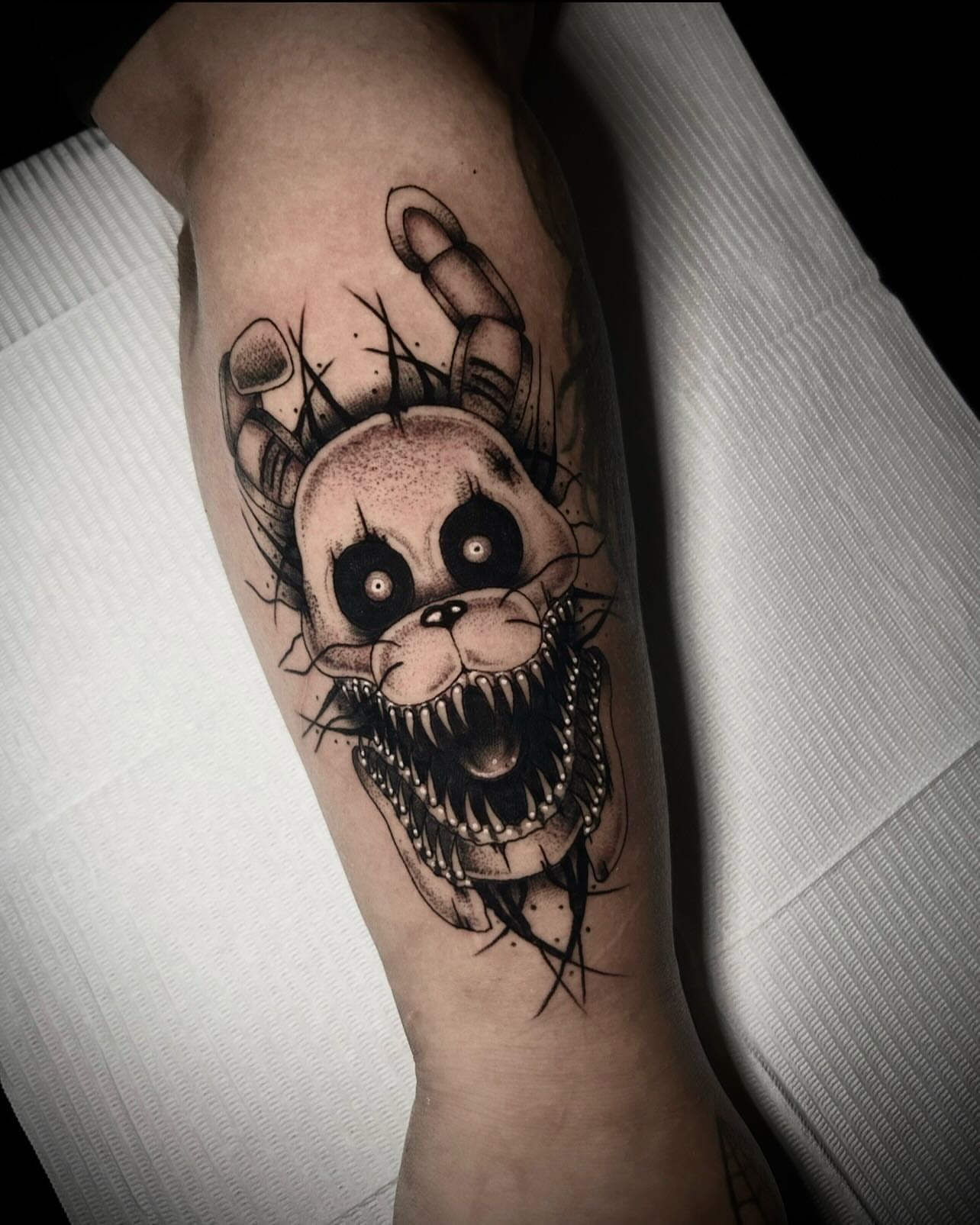 Scary bunny dark realism tattoo on the forearm by Heaven Arianna